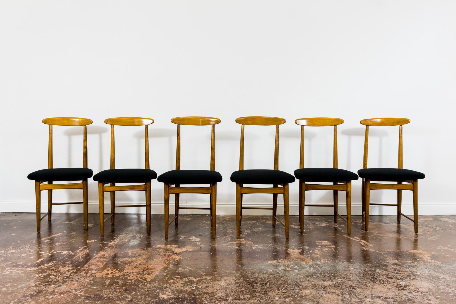Set of 6 dining chairs designed by Bernard Malendowicz 1960's, Poland.
Chairs have been completely restored and refinished.
Upholstered seats in black easy to clean fabric.