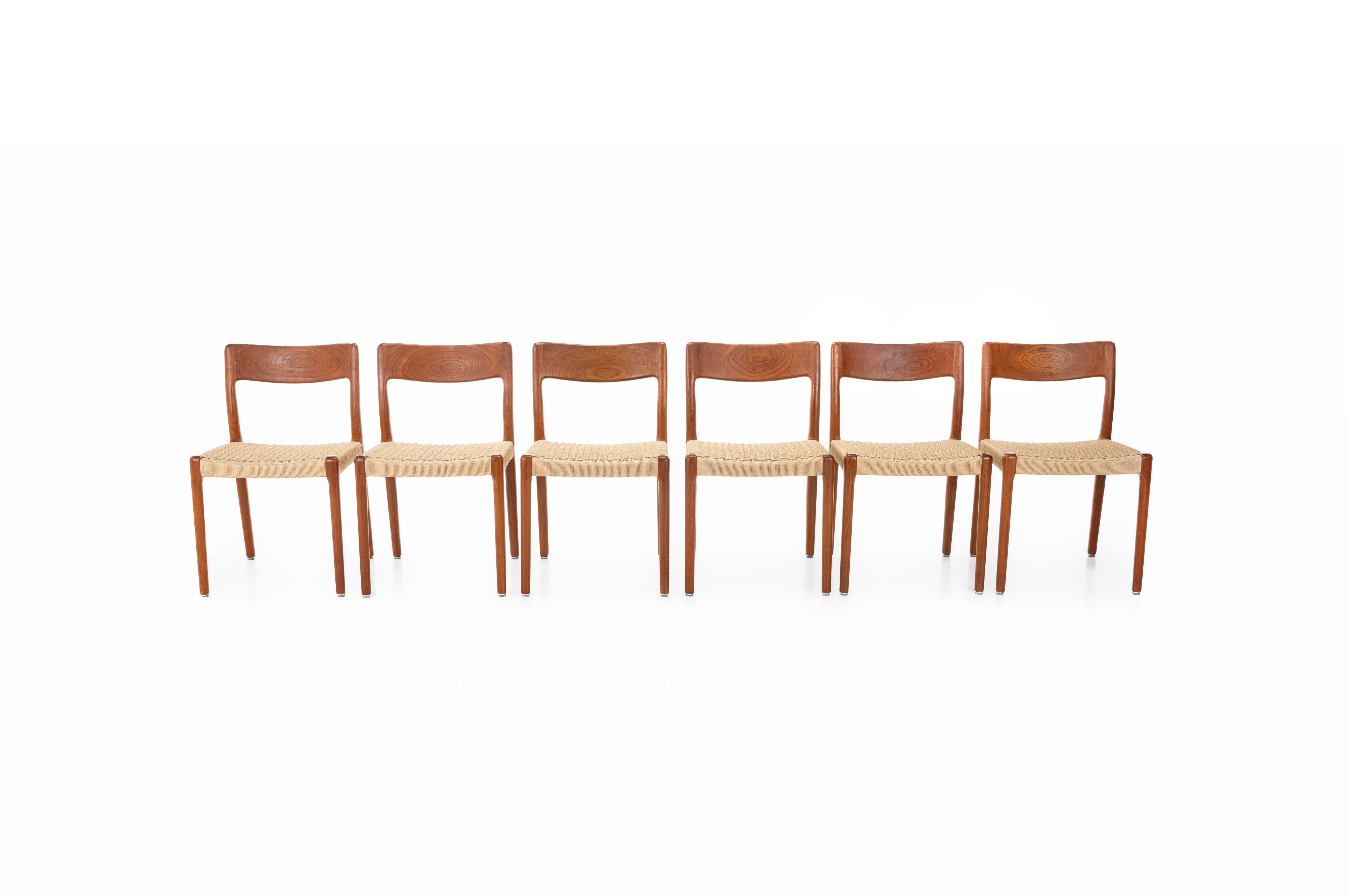 Set of six vintage dining chairs manufactured EMC Møbler, Denmark 1960s. These chairs have a teak frame and a new papercord seating. In very good condition and marked by the producer.

Dimensions:
W: 48 cm
D: 49 cm
H: 78,5 cm