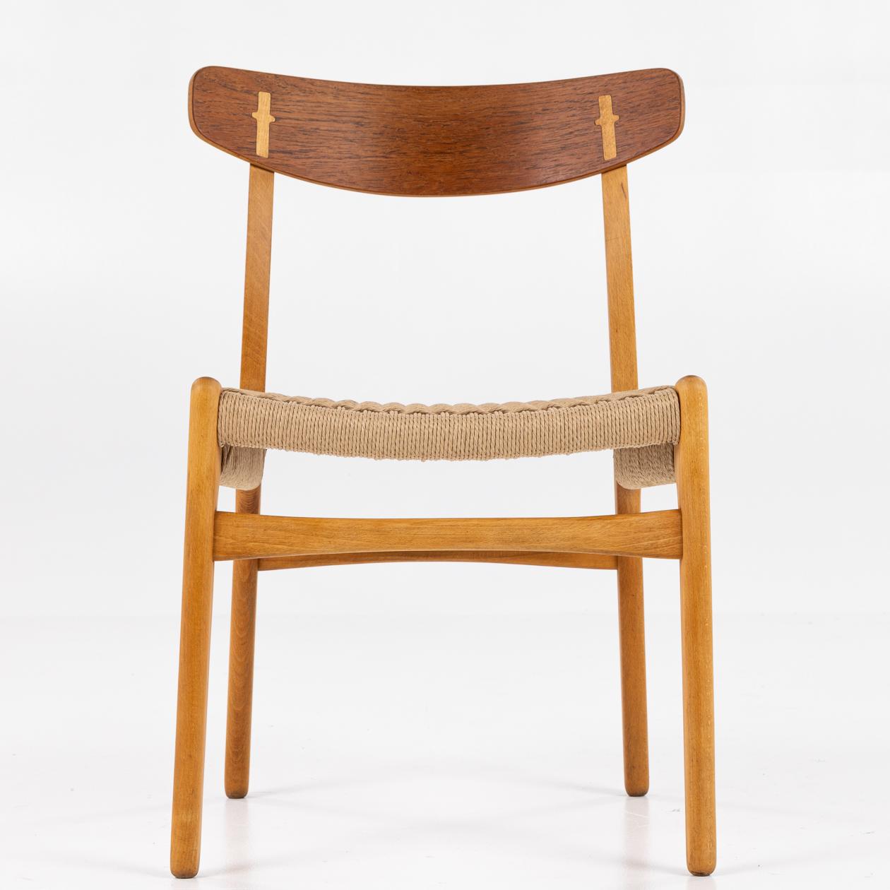 CH 23 - Dining chair in teak and beech with seat in new paper cord. Hans J. Wegner / Carl Hansen