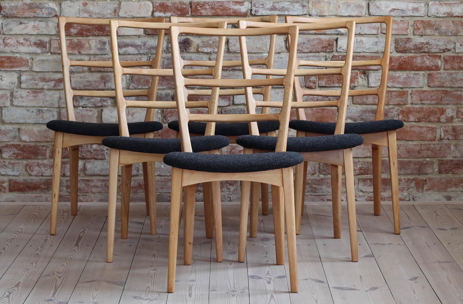 This set of six vintage dining chairs was designed by Marian Grabinski around 1960s, famous Polish designer. The chairs are very light in form and comfortable in use. The chairs have been completely restored finished in natural oil that protects the
