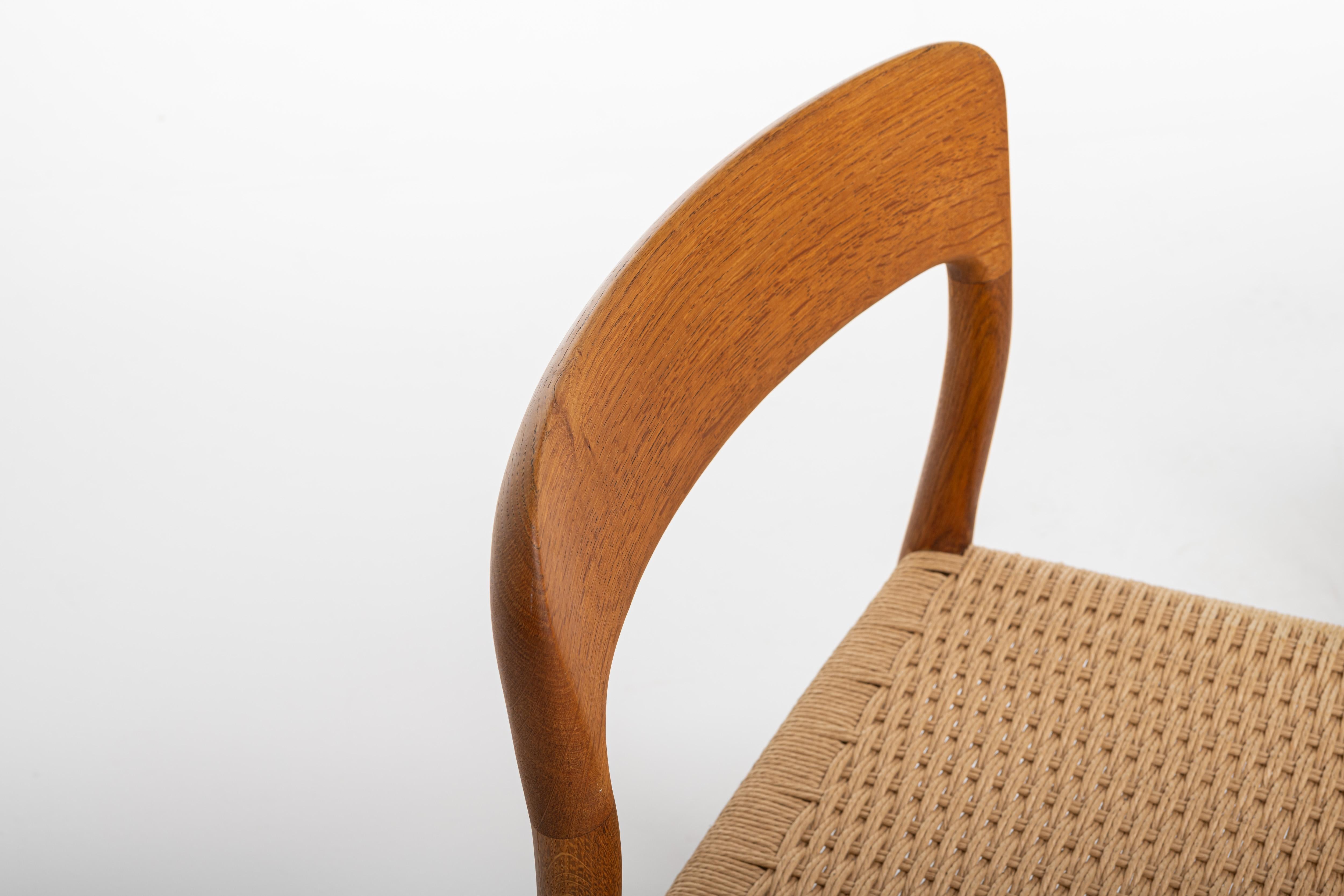 Set of six 'Model 75' dining chairs designed by Niels Otto Møller for J.L. Møllers Møbelfabrik, Denmark 1960s. The chairs have an oak frame and a papercord seating. The chairs are marked by the producer and are in very good