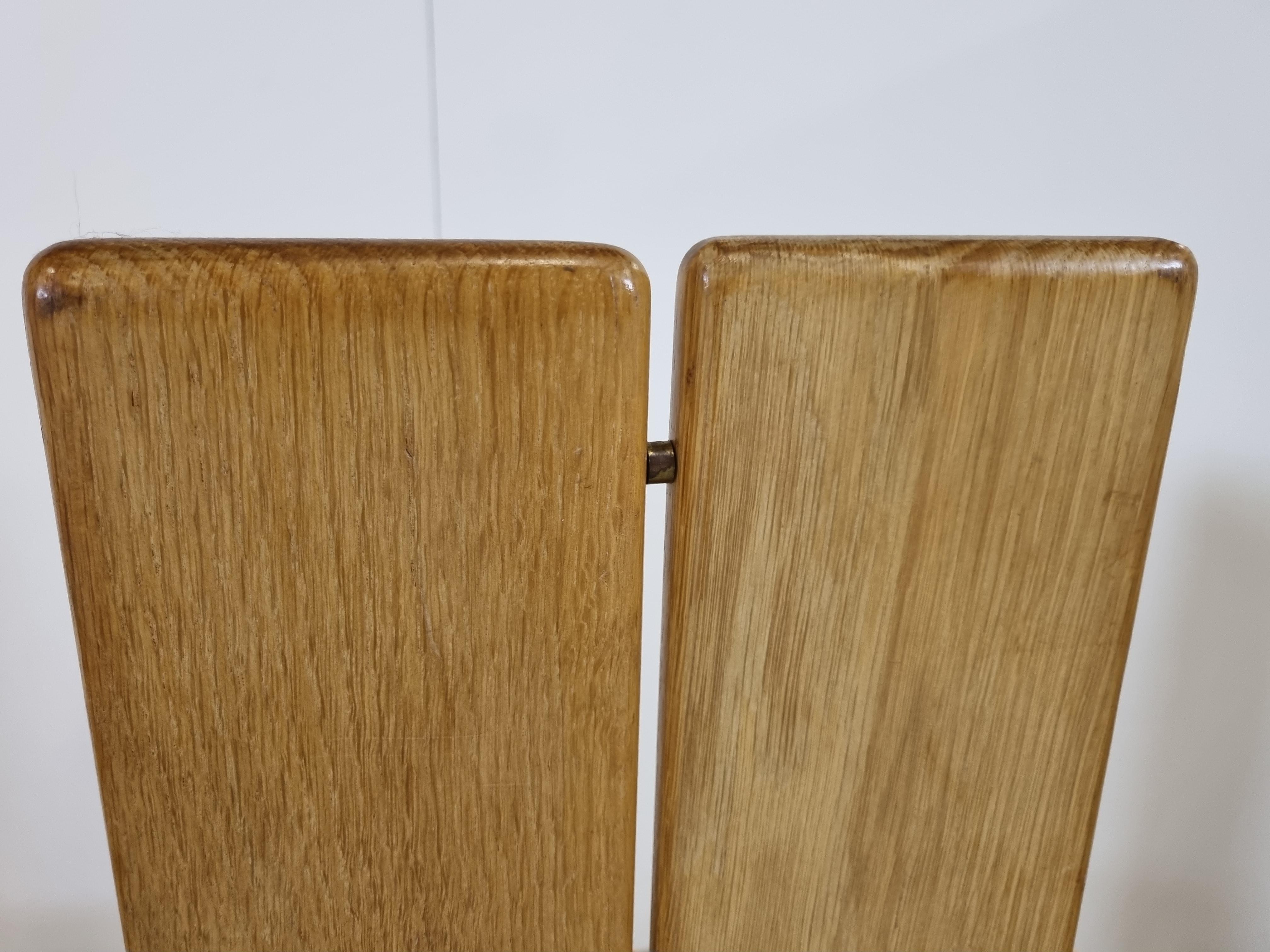 Elegant bentwood oak dining chairs by Rob & Dries Van den Berghe - (Van Den Berghe Pauvers furniture makers from Belgium)

The chairs have beautifully crafted bentwooden frames with split back panels whcih form the legs and backrests all at