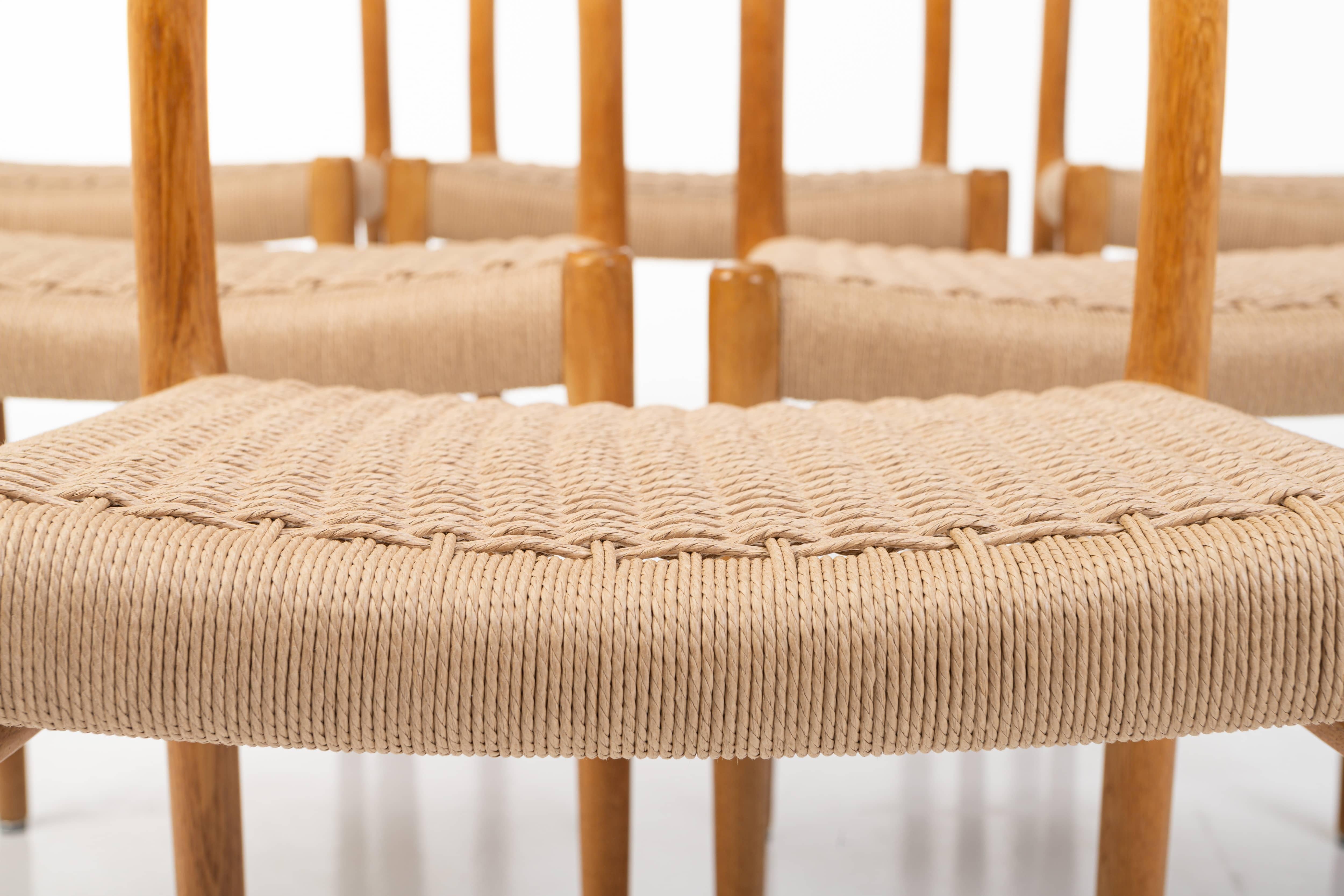 Scandinavian Modern Set of 6 Dining Chairs in Oak and Papercord by Niels Otto Møller for J.L. Møller