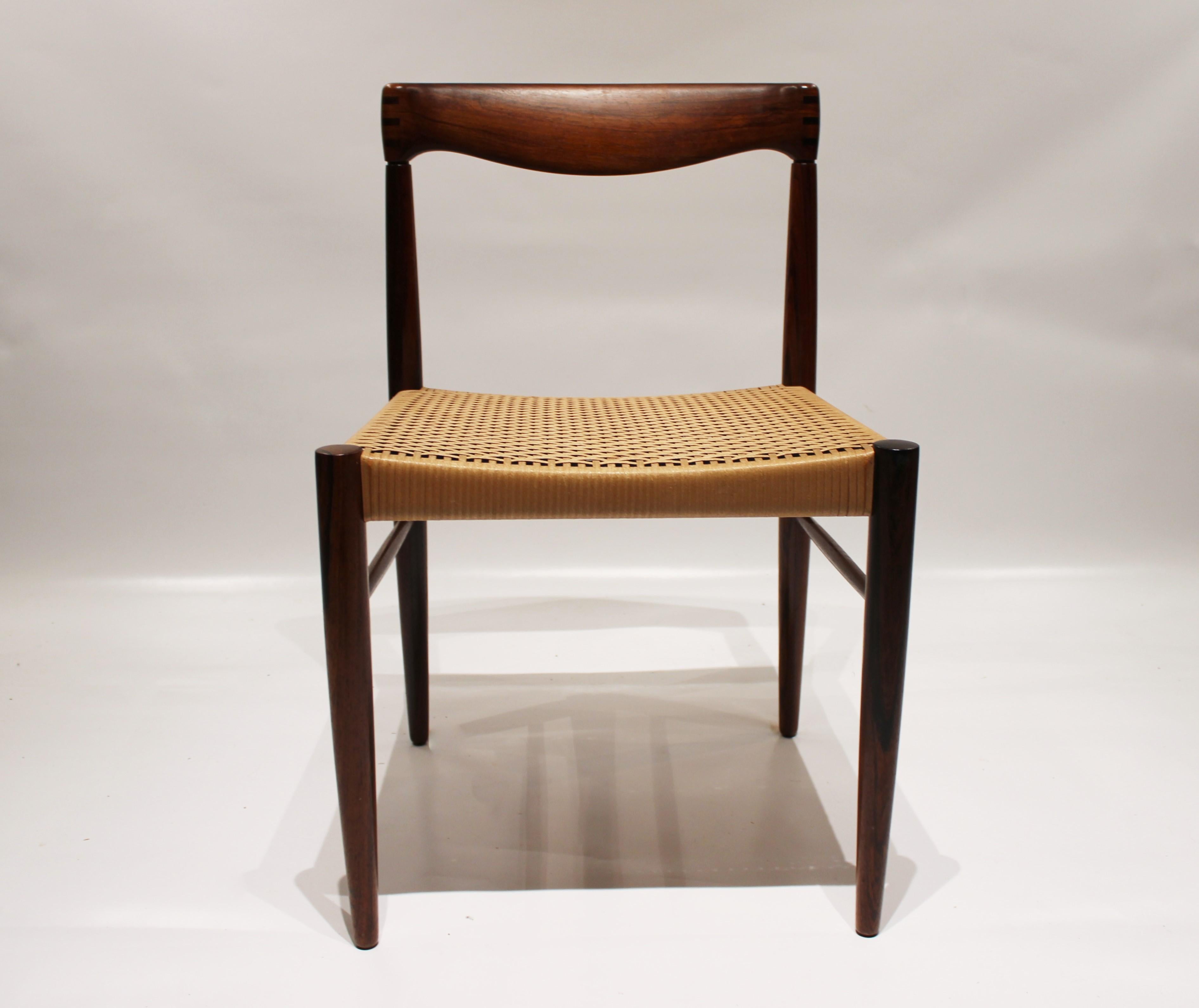 Set of 6 dining chairs in rosewood and papercord designed by H.W. Klein and manufactured by Bramin furniture factory in the 1960s. The chairs are in great vintage condition.
 
