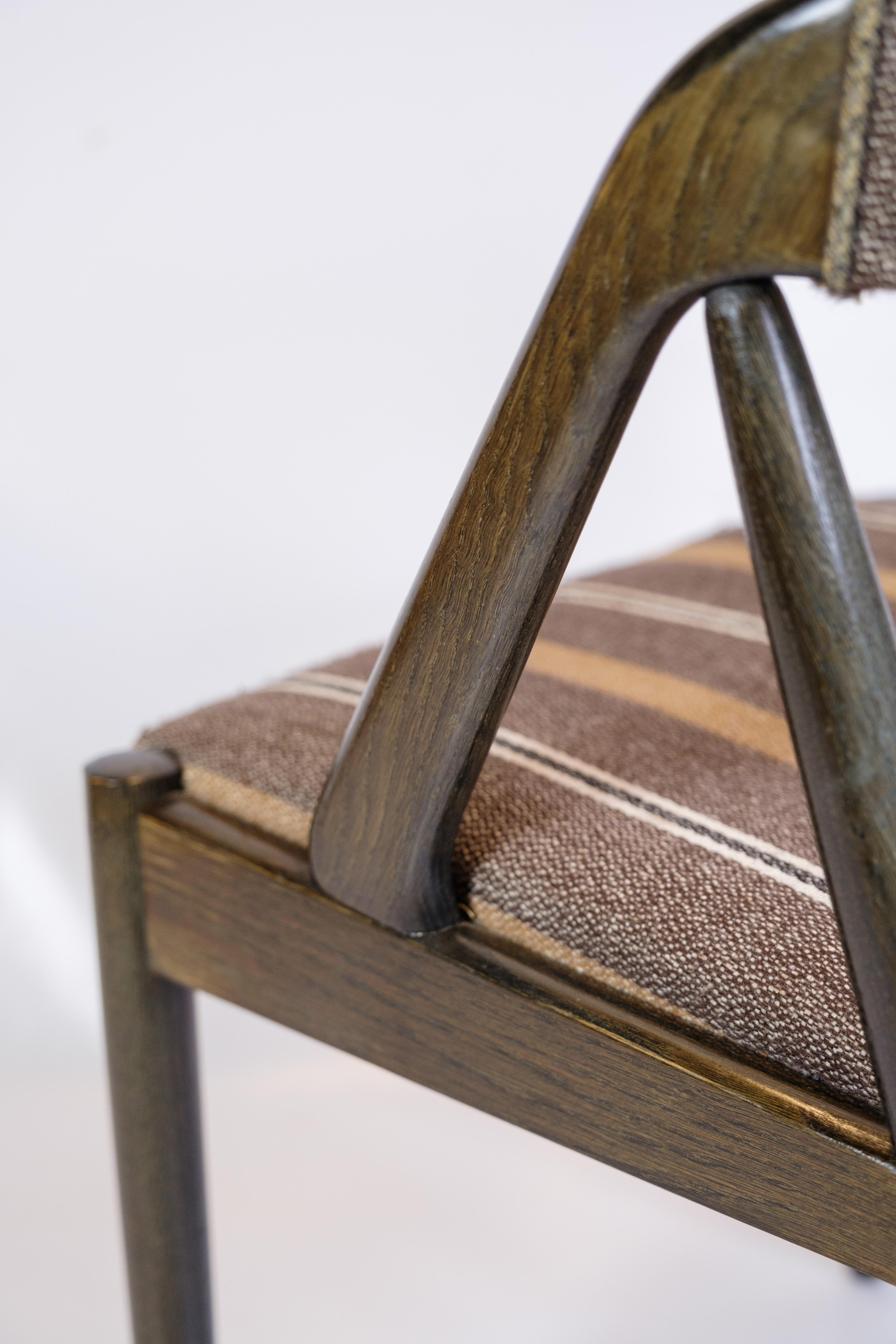 Bois Ensemble de 6 chaises de salle à manger modèle 31 fabriquées en bois foncé par Kai Kristiansen des années 1960 en vente