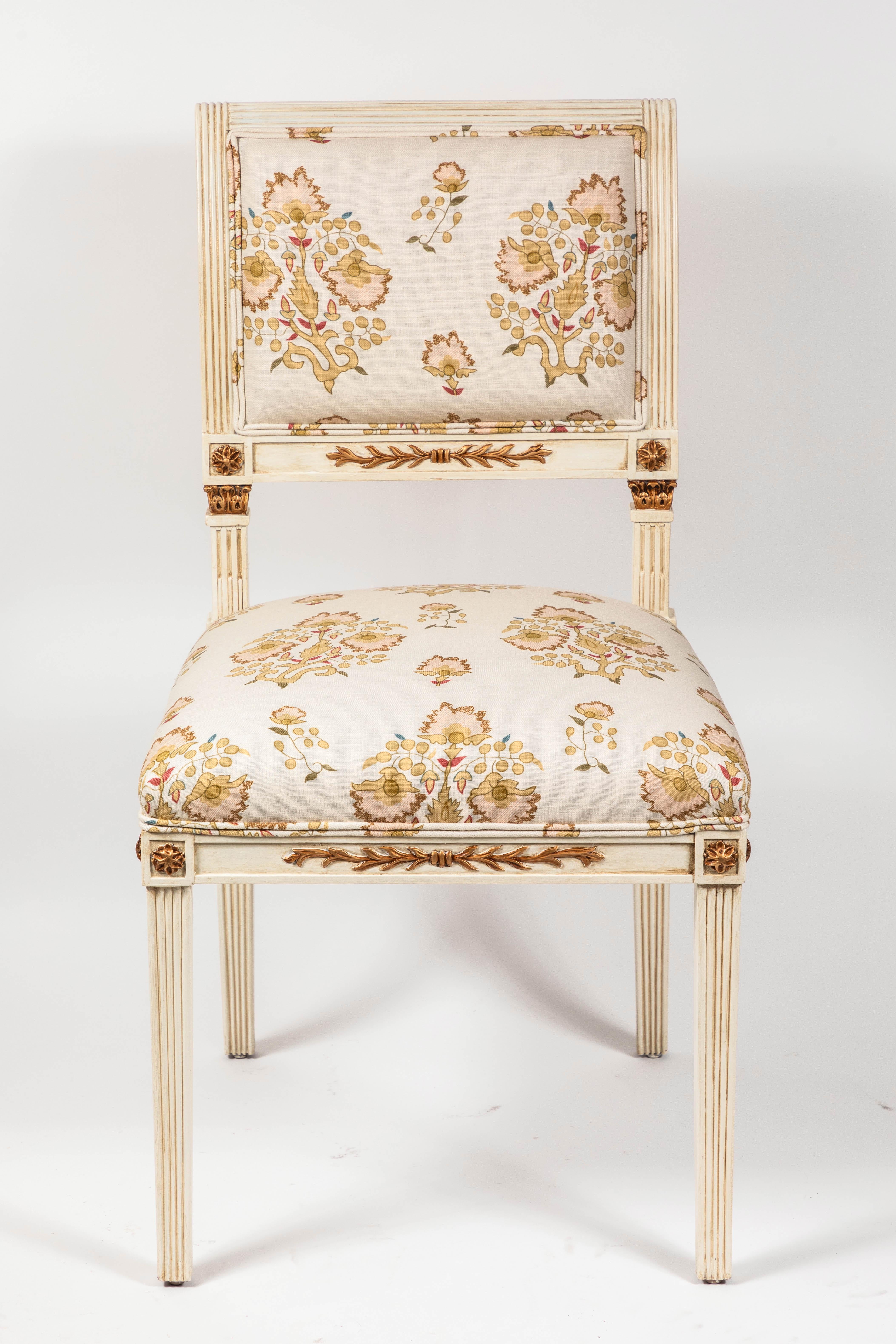 Set of 6 French country style dining chairs newly upholstered in Penny Morrison 100% linen “Rumeli.” 

Solid hard wood frames w/ new painted finish of antique white w/ gold details.

*4 additional chairs available.