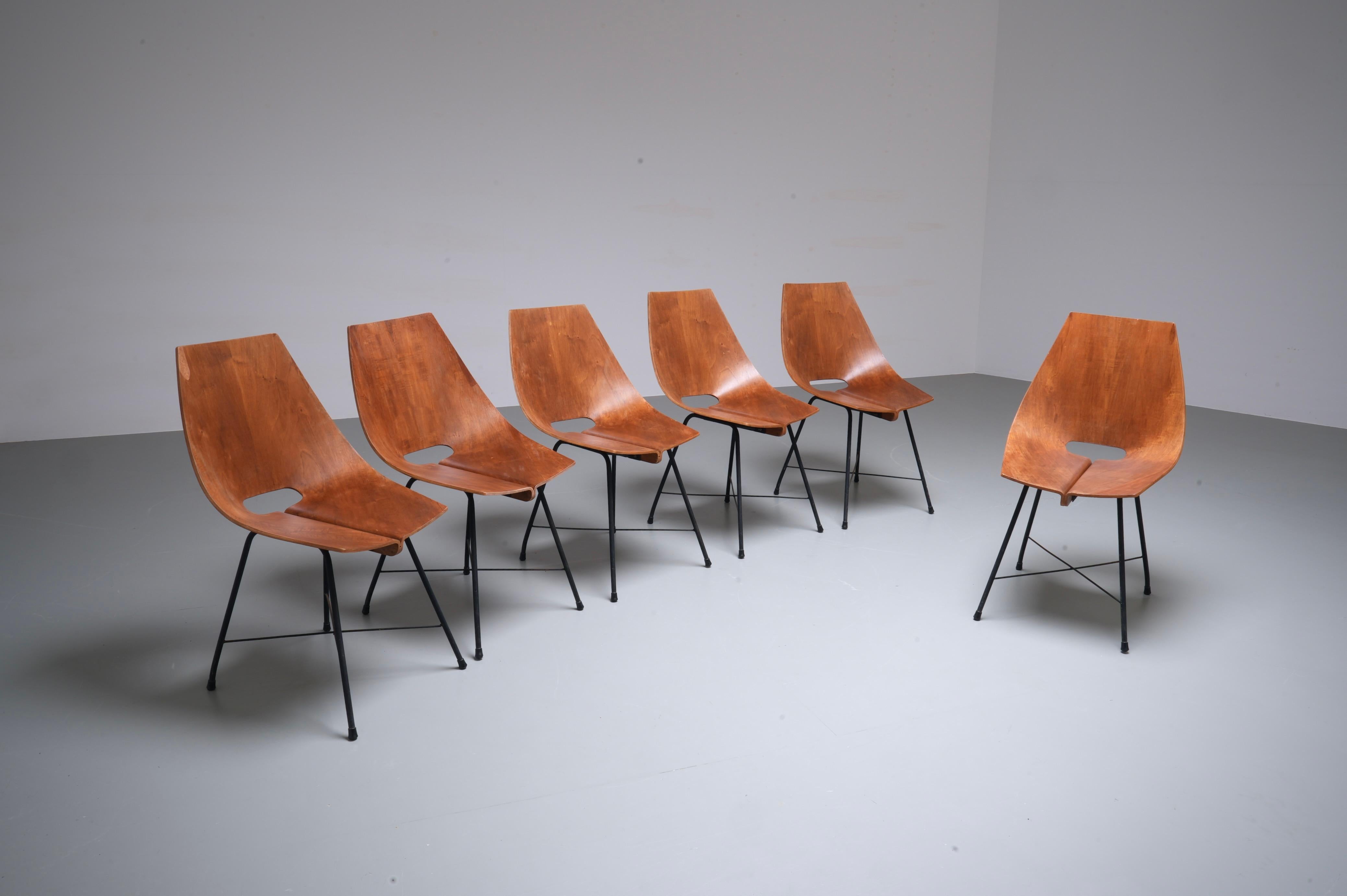 We fully restored this set by adding new small pieces of veneer (where needed) to all the chairs and lacquering them three times. More than 10% of the veneer had to be replaced but hey you want to be circular and sustainable right? The result is a