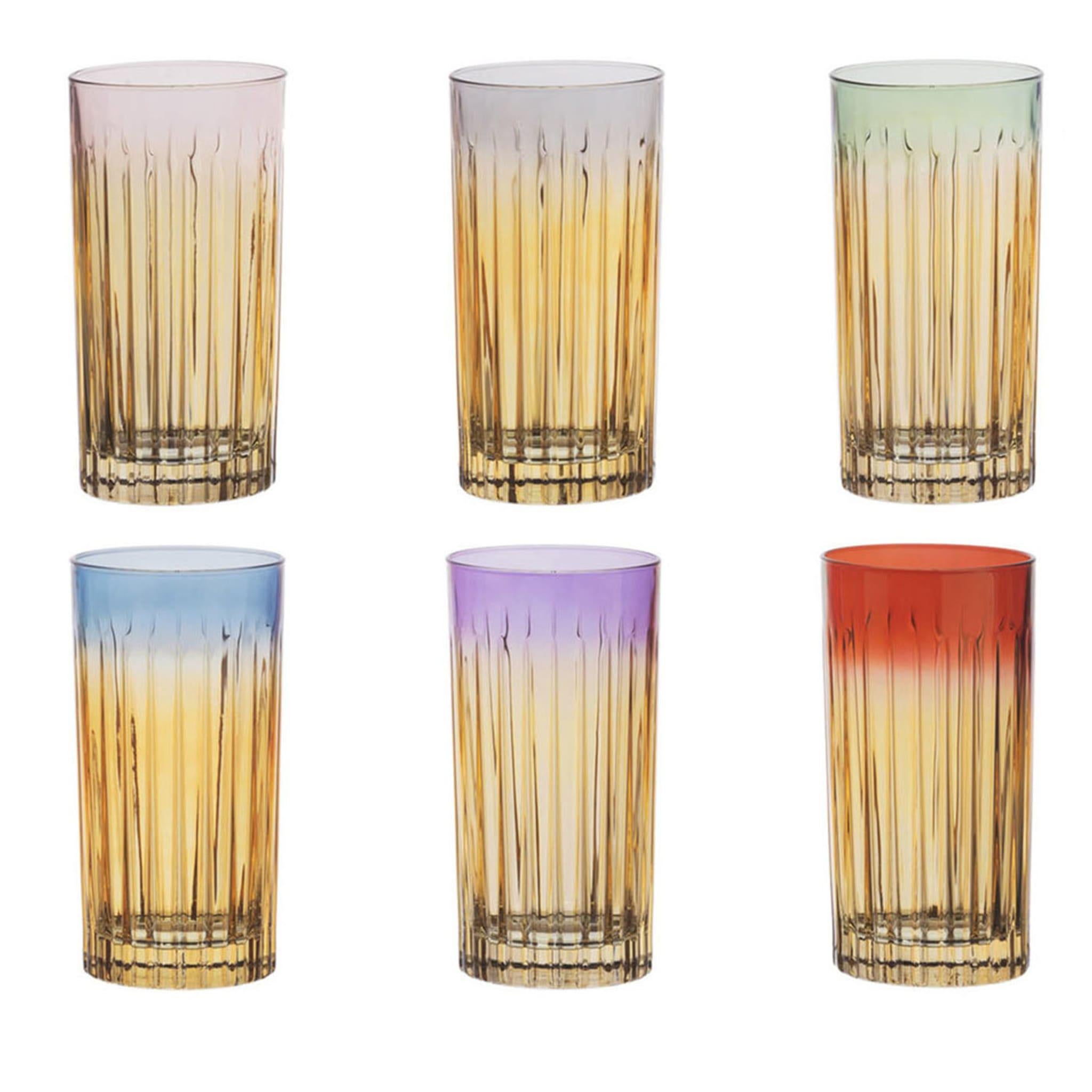 The rim of each of the glasses in this set bares a unique color of its own. Each handmade glass also has an ombre effect transforming the bright rim color into a smoky transparent shade at the bottom.