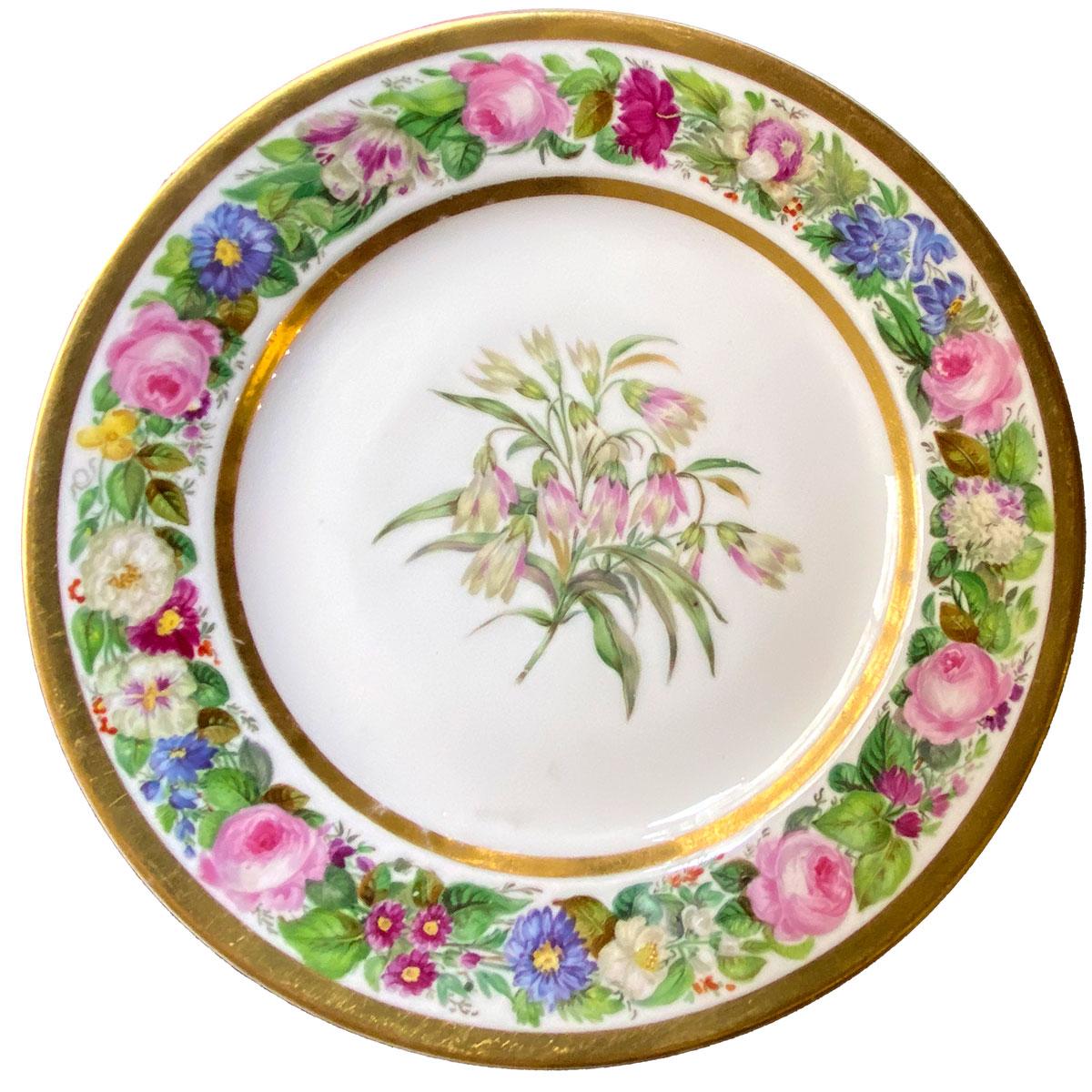 Set of 6 very rare plates in hand-painted and gilt porcelain with flowery decoration. Each plate is decorated with a specific flower: narcissus, bindweed, poppy, daisy, sweet pea, and balsam. Each one is framed by a fantastic swag of flowers very