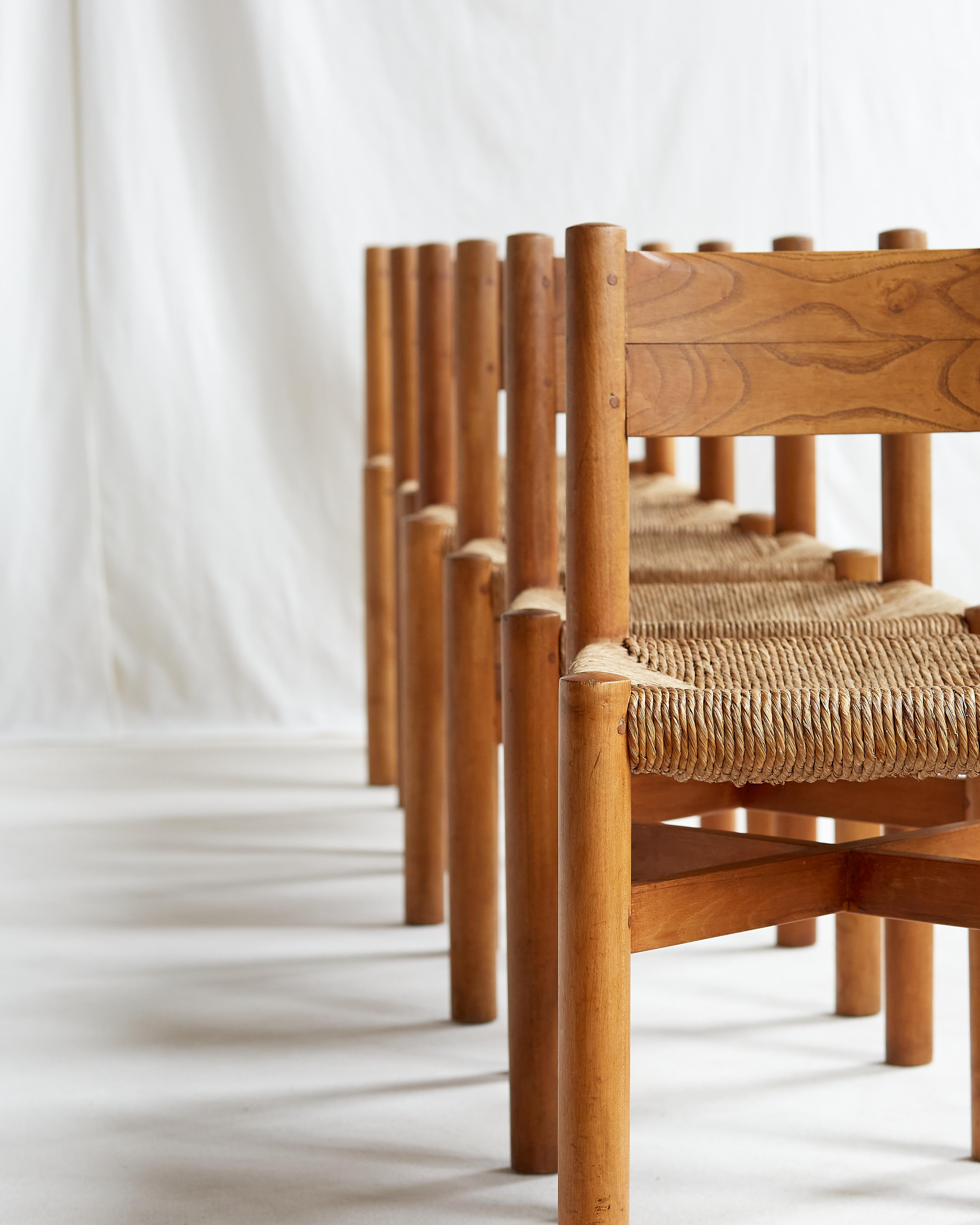 A rare set of six first production Charlotte Perriand Meribel chairs.

This set was produced by George Blanchon (B.C.B) circa 1948 and are completely original and untouched. The patina is beautiful. The back leg has a slight bend which is unique
