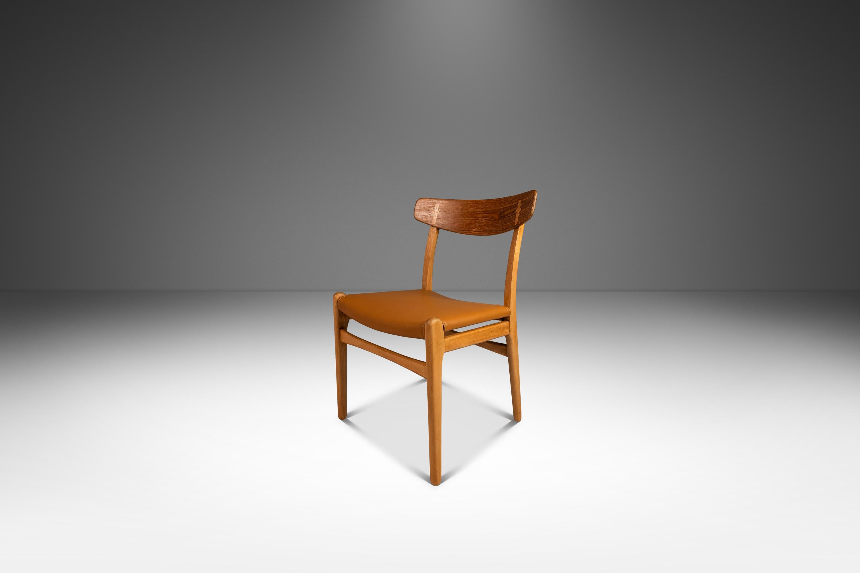  Introducing a rare, expansive set of rare early Model CH 23 dining chairs by Hans J. Wegner for Carl Hansen & Søn built in Denmark in the late 1950's. The CH 23 dining chair, like many of Hans J. Wegner’s other iconic designs, is clean and simple
