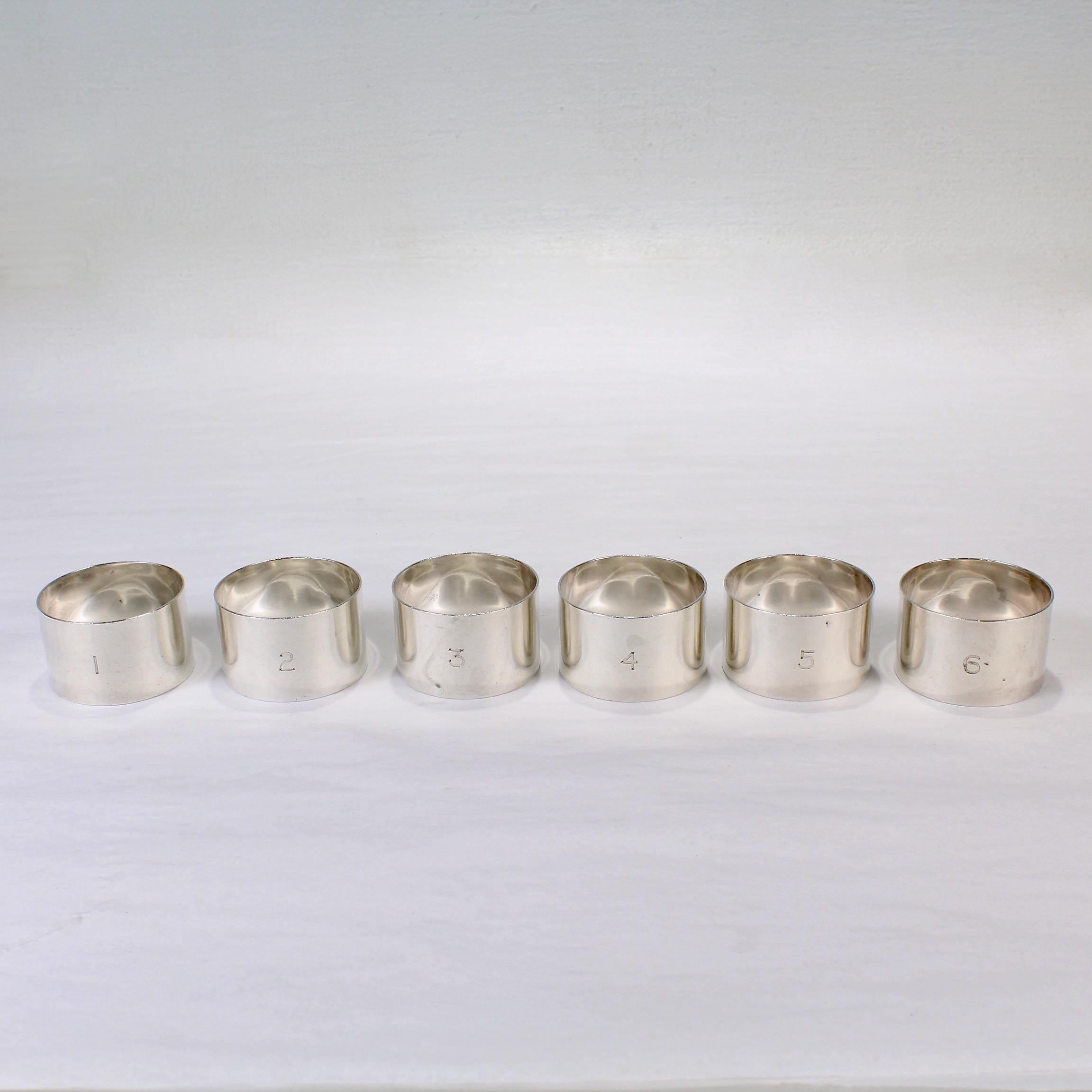 A fine numbered set of 6 Edwardian sterling silver napkin rings. 

By the Adie Brothers of Birmingham, England.

Each napkin ring has an engraved number 1 through 6.

Simply a great set of English napkin rings!

Date:
1913

Overall Condition:
They
