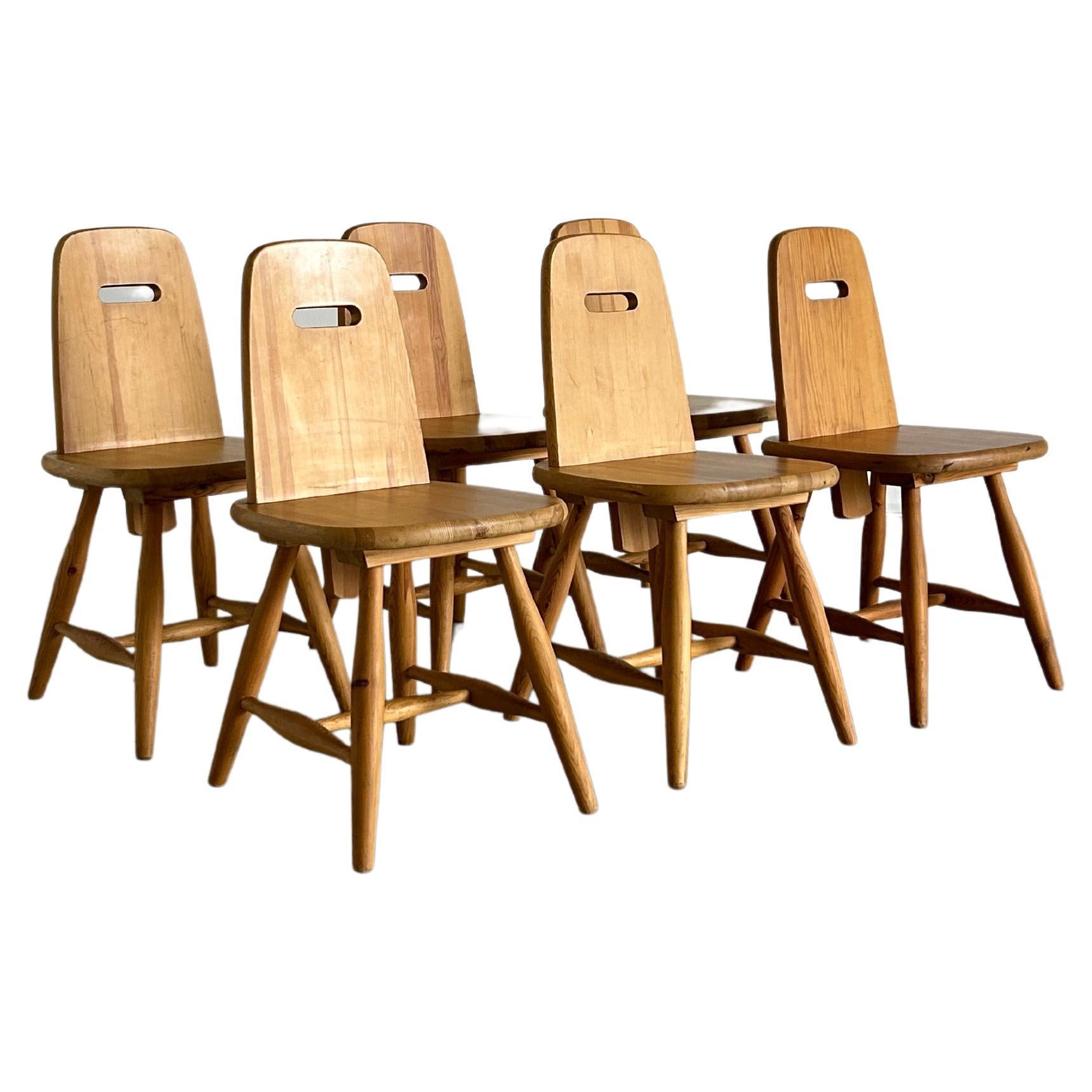 Eero Aarnio for Laukaan Puu, set of six dining chairs, solid pine, Finland, 1960s.

This set of six Finnish dining chairs holds a strong expression and has an organic design with rounded corners and edges. The legs are high and tapered which