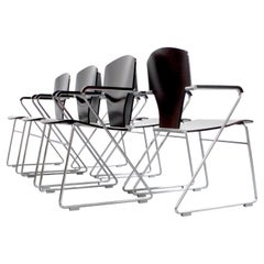 Set of 6 "Egoa" chairs with chromed steel frame and laminated wood seat and back