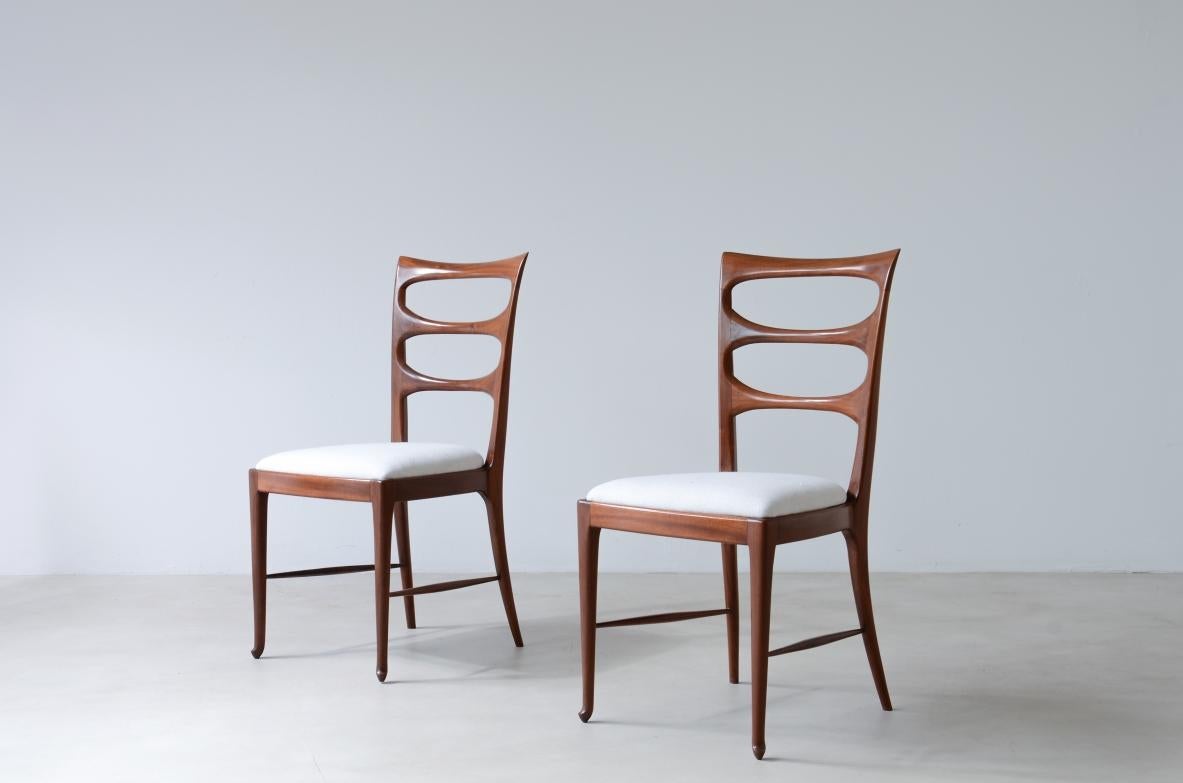 COD-1893
Paolo Buffa (1903-1970)

Set of 6 elegant dining chairs in walnut with nice carved back and upholsterd seat.

Manifactured by Serafino Arrighi, Italy, 1938.

Bibl. Mobili di Paolo Buffa