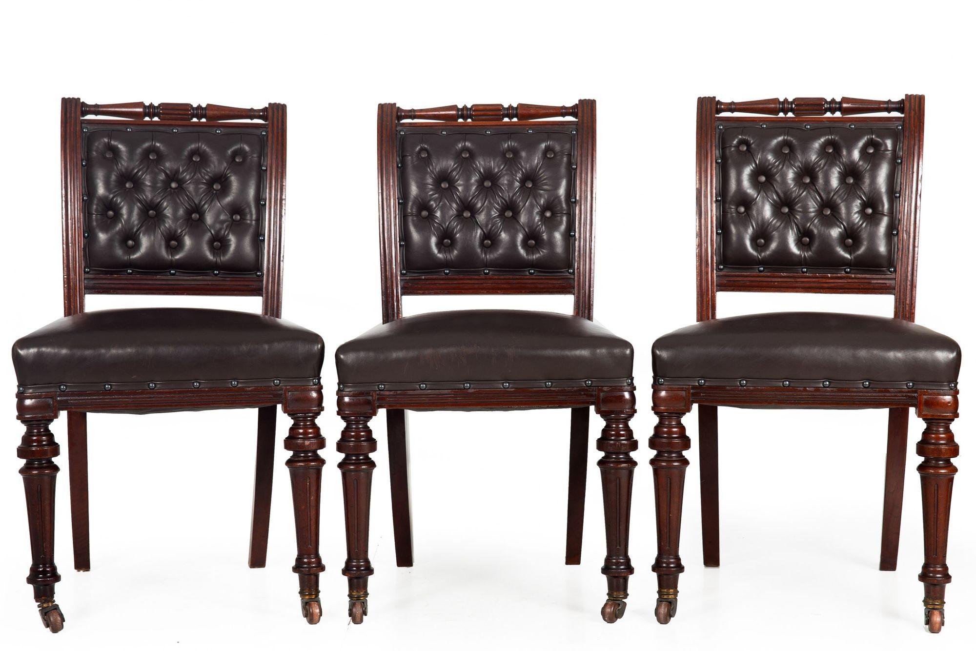 CLASSICAL TURNED MAHOGANY AND TUFTED LEATHER DINING CHAIRS
A set of 6  England, ca. late 19th century
Item # 309KJT22Z

A gorgeous set of six Classical chairs, they develop on elements of the William IV era to create a vibrant and timeless