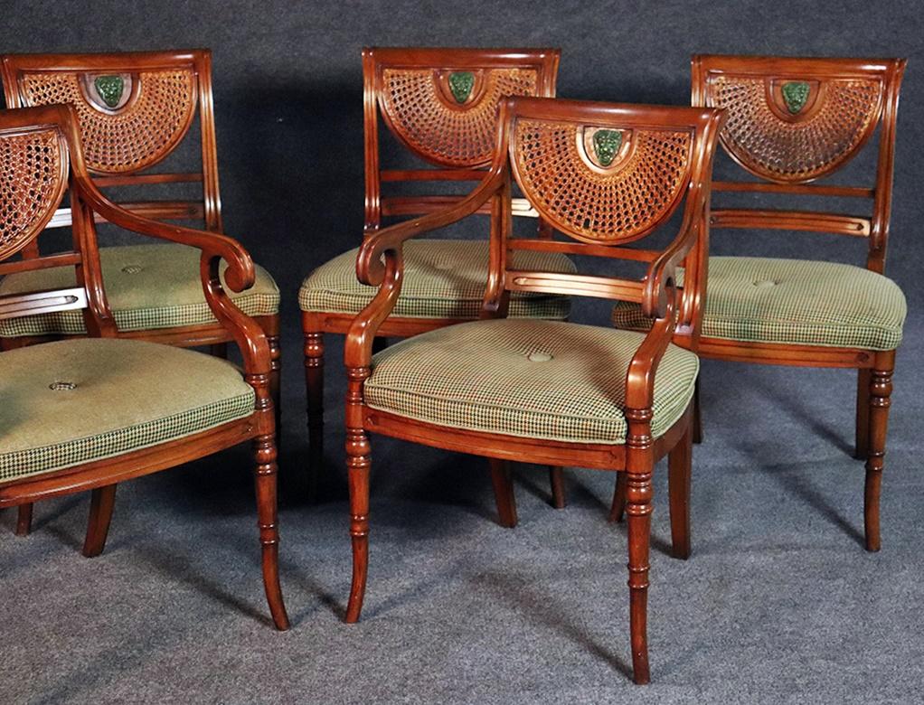 Set of 6 English Regency style caned back dining chairs with lions.