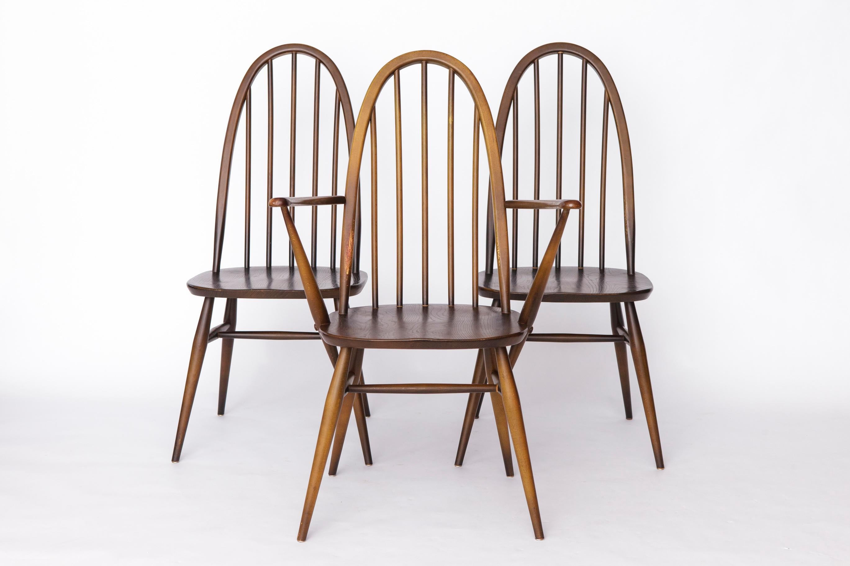 Set of 6 Dining Chairs by Ercol, 1960s. 
Known as “Quaker” Windsor Chairs. 
Design: Lucian Ercolani. 
The listed price is for a set of 6.

Crafted from solid elm wood with stained finish, these chairs feature the timeless Windsor silhouette.
Frames