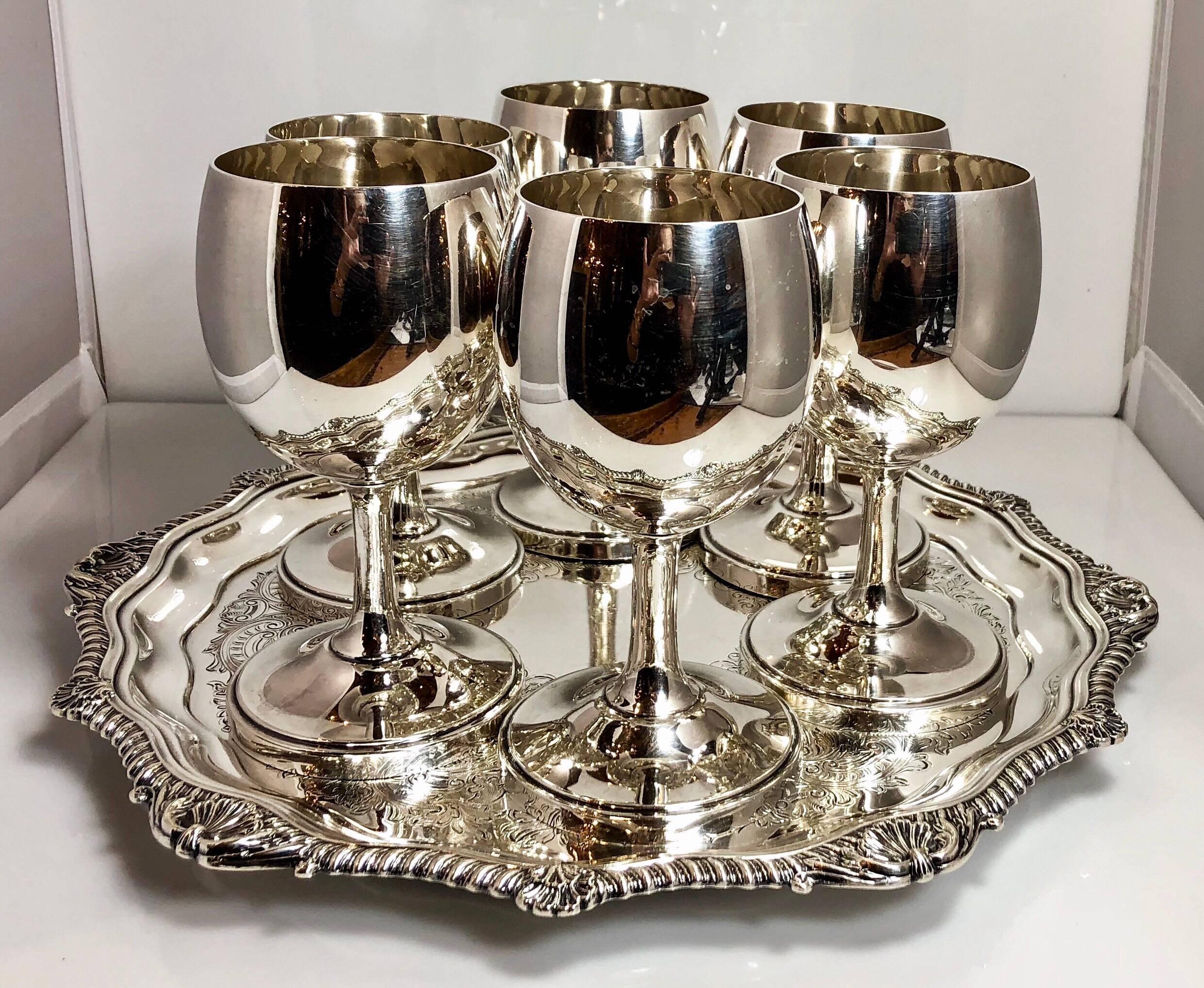 Set of six estate American sterling silver cordial glasses, circa 1930. 
(Antique silver tray sold separately).