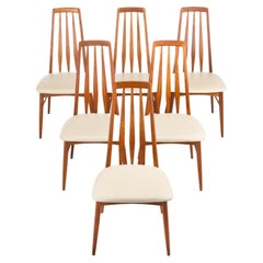 Set of 6 'Eva' dining chairs in teak and cream