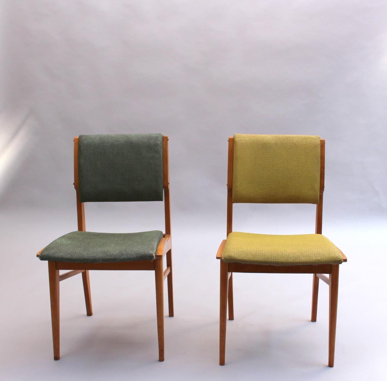 A set of six fine French mid-century beech dining chairs.