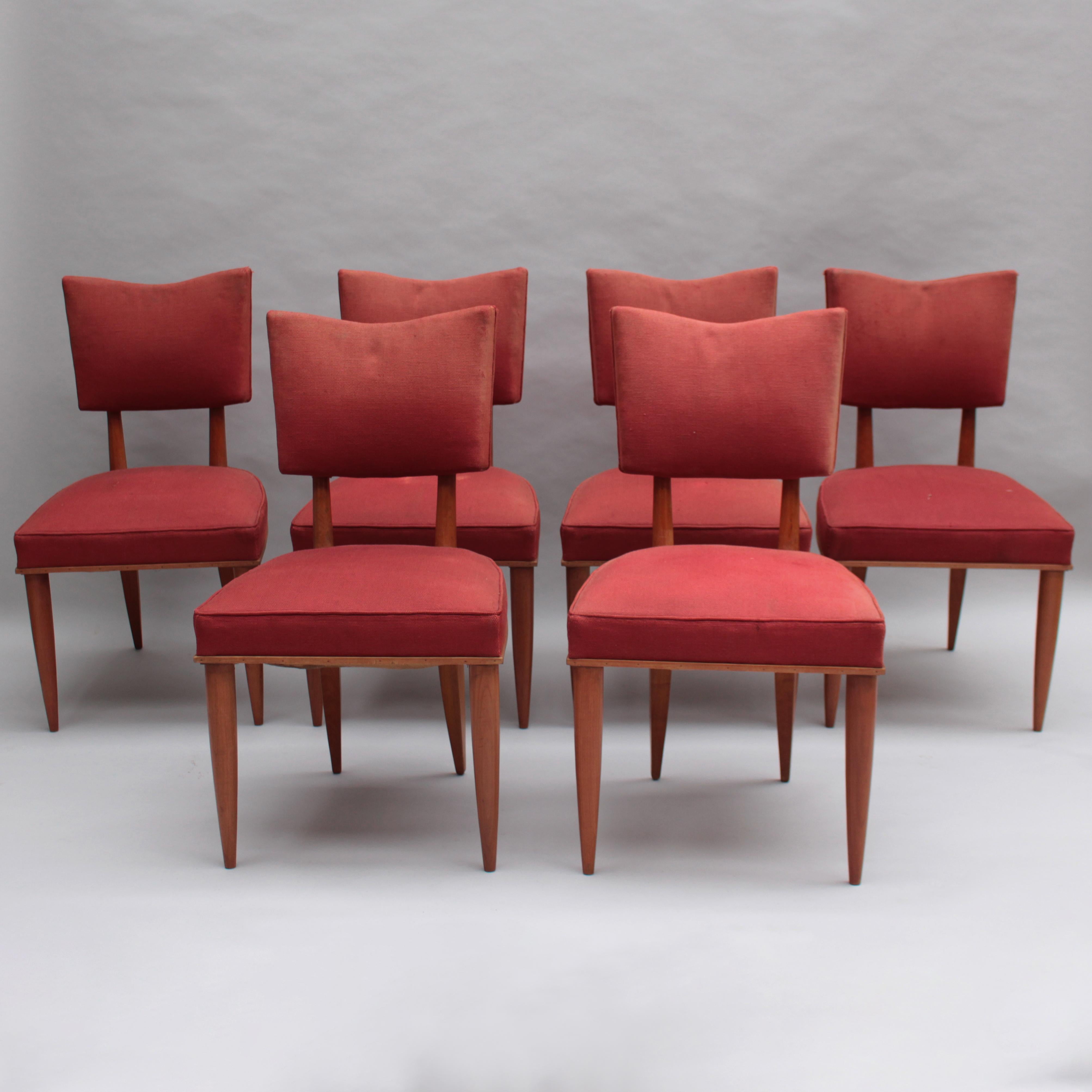 A set of six fine French Mid-Century solid cherry side chairs
