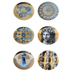 FORNASETTI set de 6 assiettes murales Fornasetti de Louis Vuitton