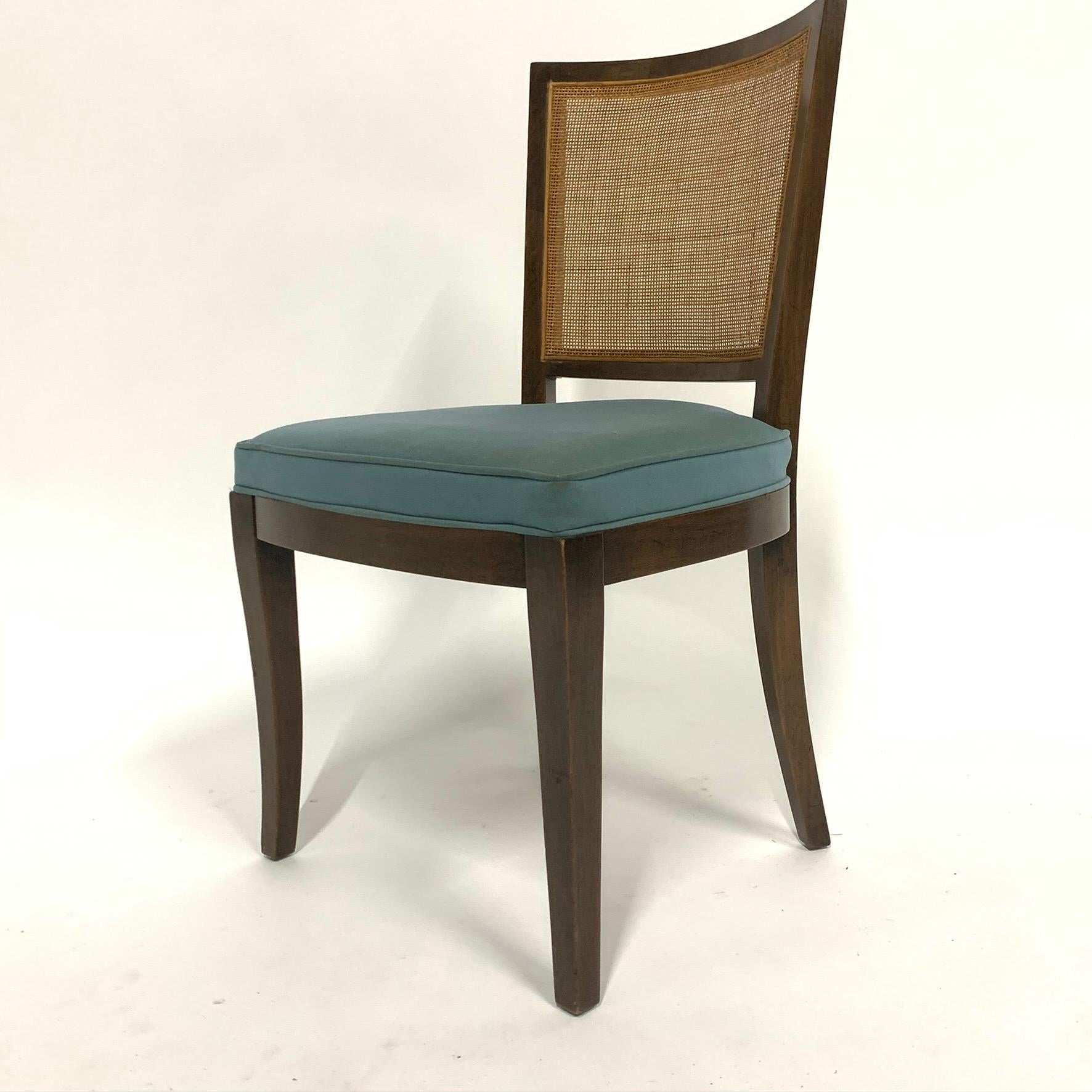 Set of stunning dining chairs designed by Bert England for Johnson Furniture’s 'Forward Trends' line. These chairs are in good original condition. All cane is intact and good.