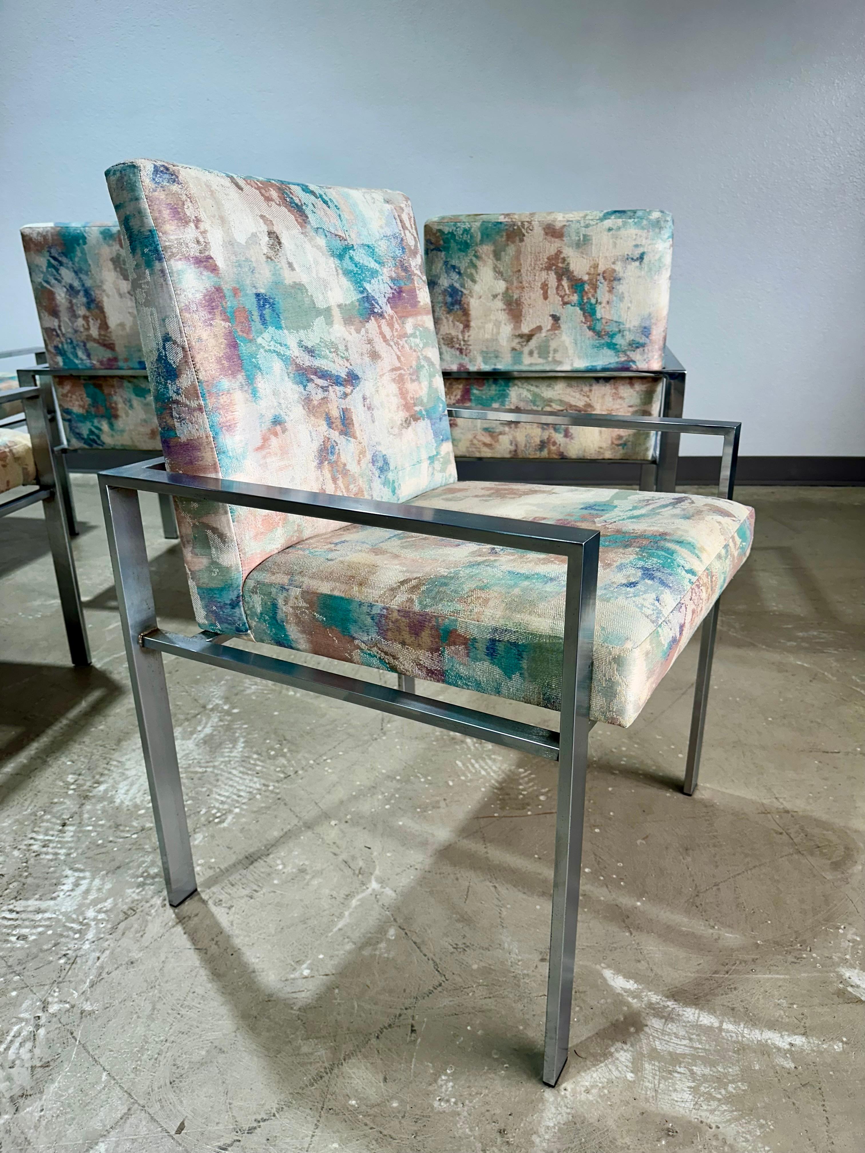Set of 6 Mid Century Modern Dining Armchairs in Brushed Chrome/Aluminum with upholstered seats. Purchased from original owners as part of a suite with the matching Founders Furniture Patterns 23 dining table and display cabinets (available
