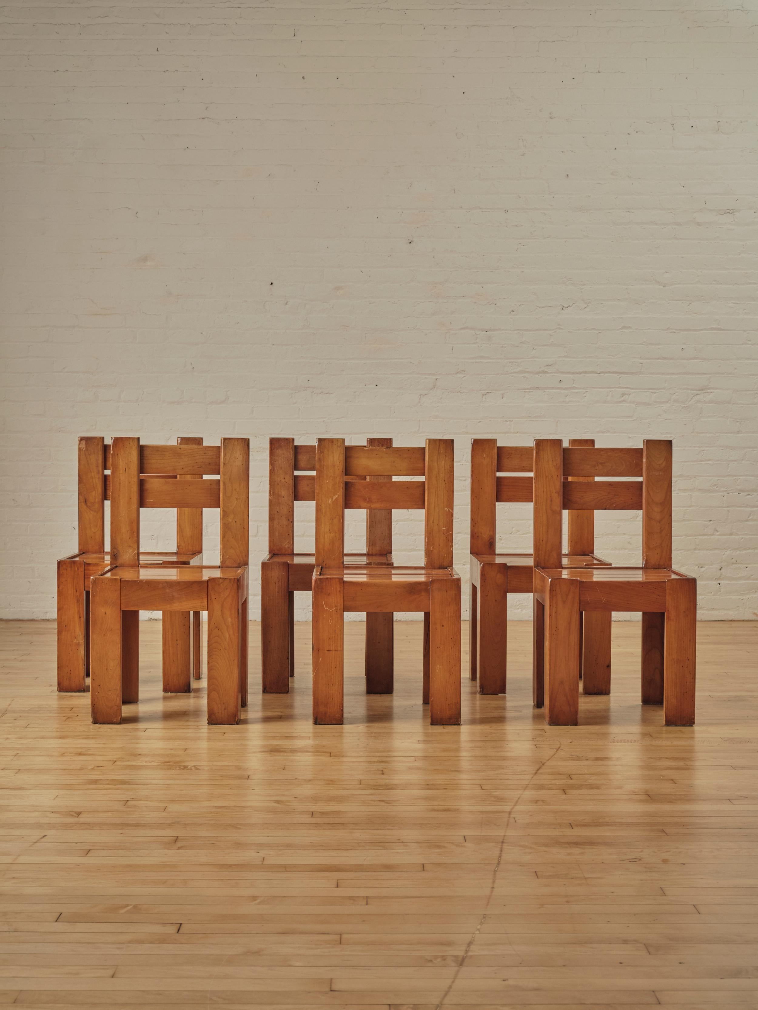 Set of 6 French Brutalist Dining Chairs with slatted pine wood seats and backrest. The pine wood construction ensures durability.