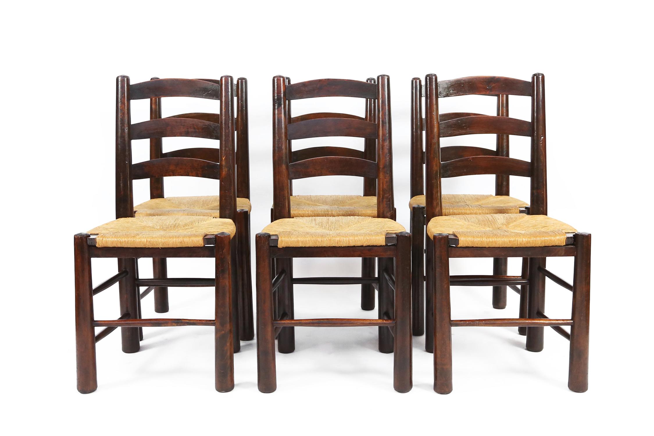 Set of 6 French chairs designed by G. Robert in stained beech and straw seats in good condition. 
These chairs are documented in 