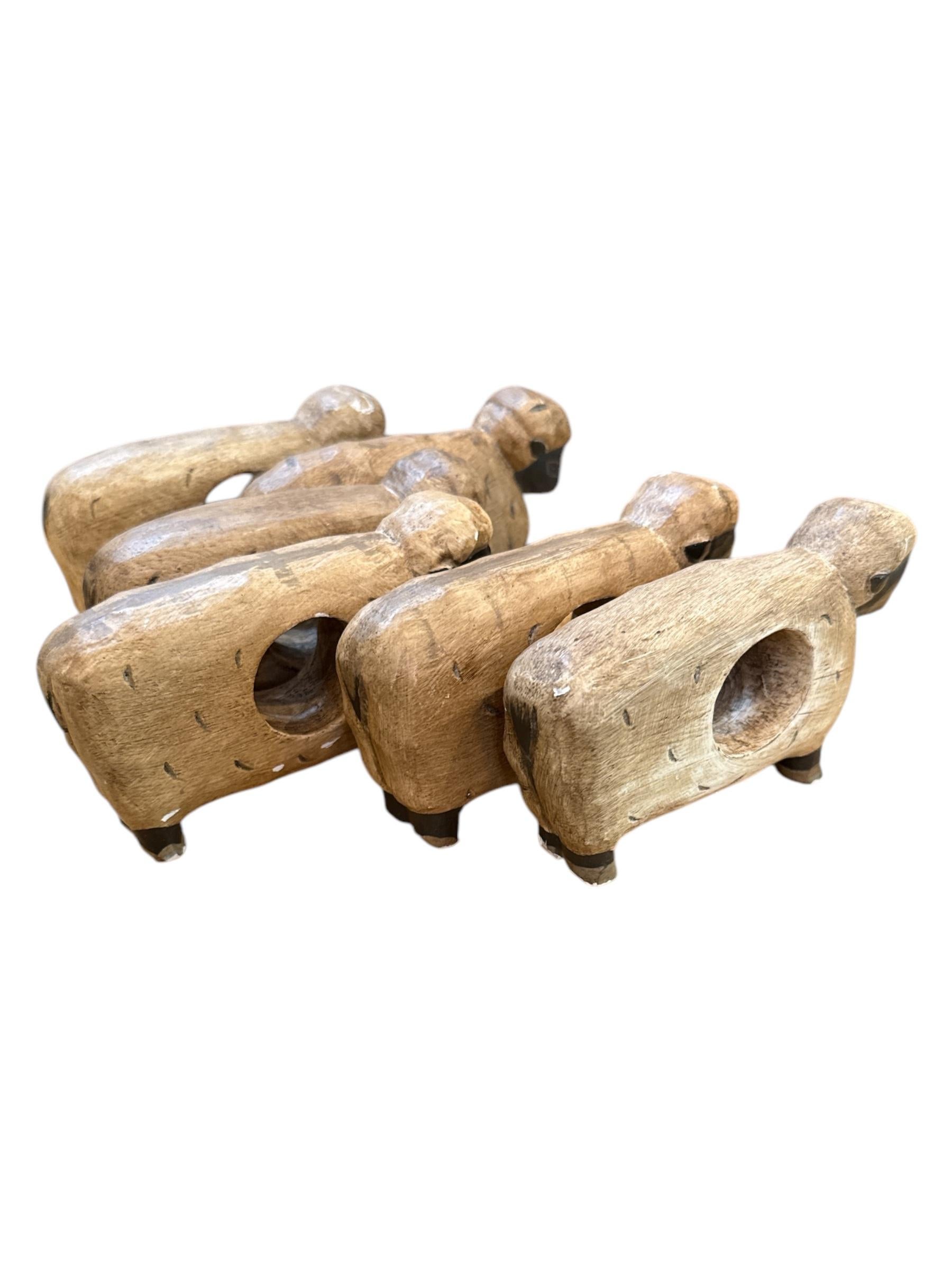 Add a touch of pastoral elegance to your table with this delightful set of six French Country sheep napkin holders. Crafted with charming detail, each holder features a playful sheep motif that brings warmth and whimsy to any dining setting.
