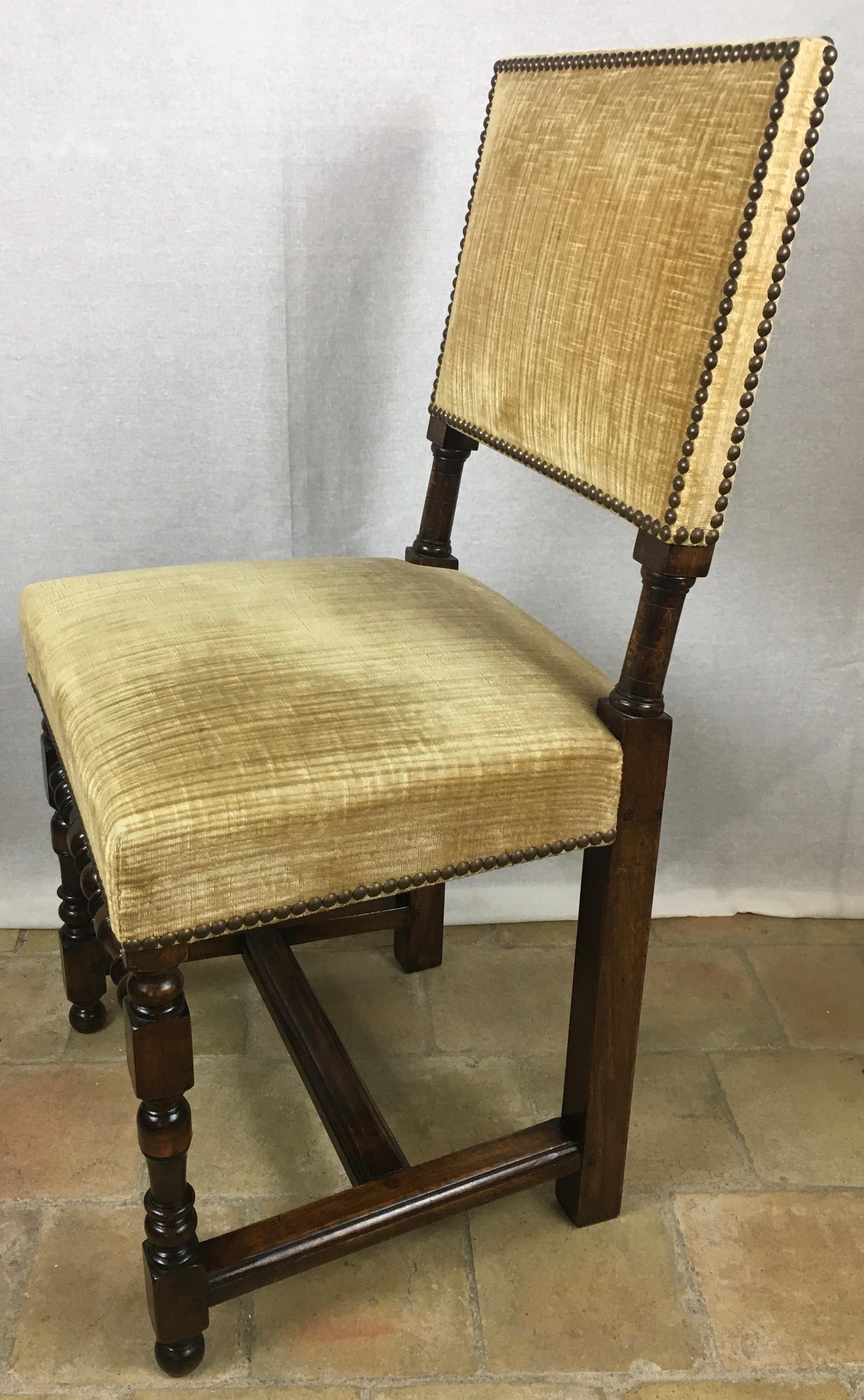 Set of 6 French Louis XIII style upholstered dining chairs.
Upholstered in a heavy fabric.
Each chair is solid and sturdy, strong enough for everyday use. 

Measures: 34 1/2