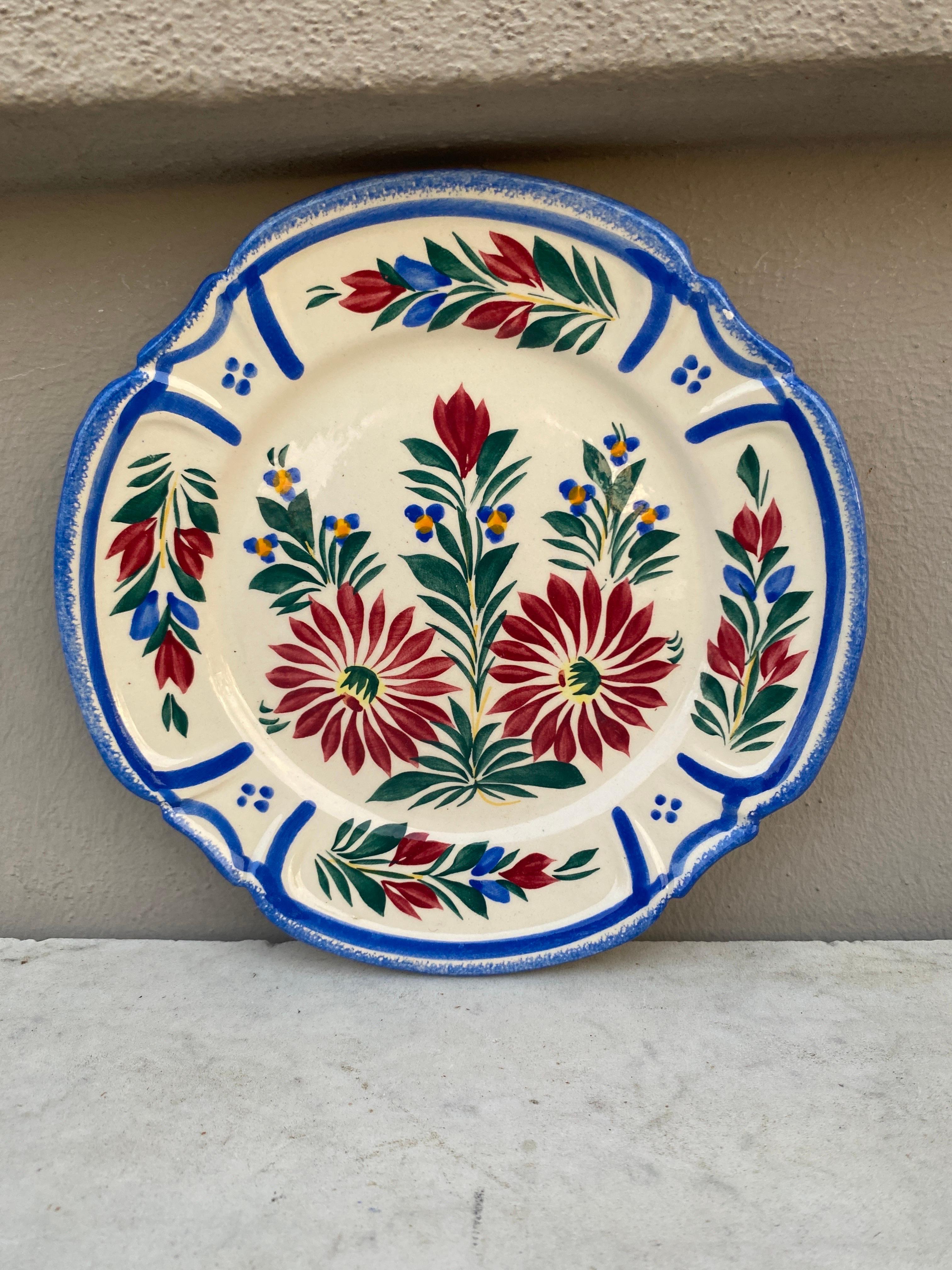 A set of 6 French faience dessert plates with a floral pattern signed HB Quimper circa 1930.
