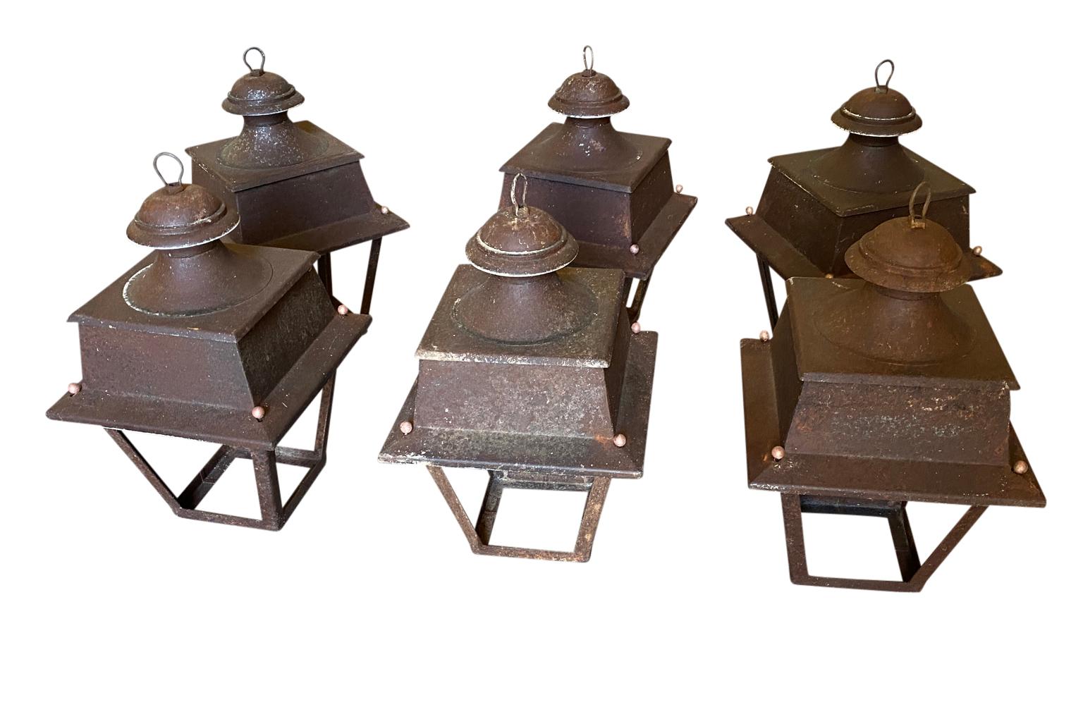A very charming Set of 6 Iron Lanterns from the South of France. Lovely minimalist lines.