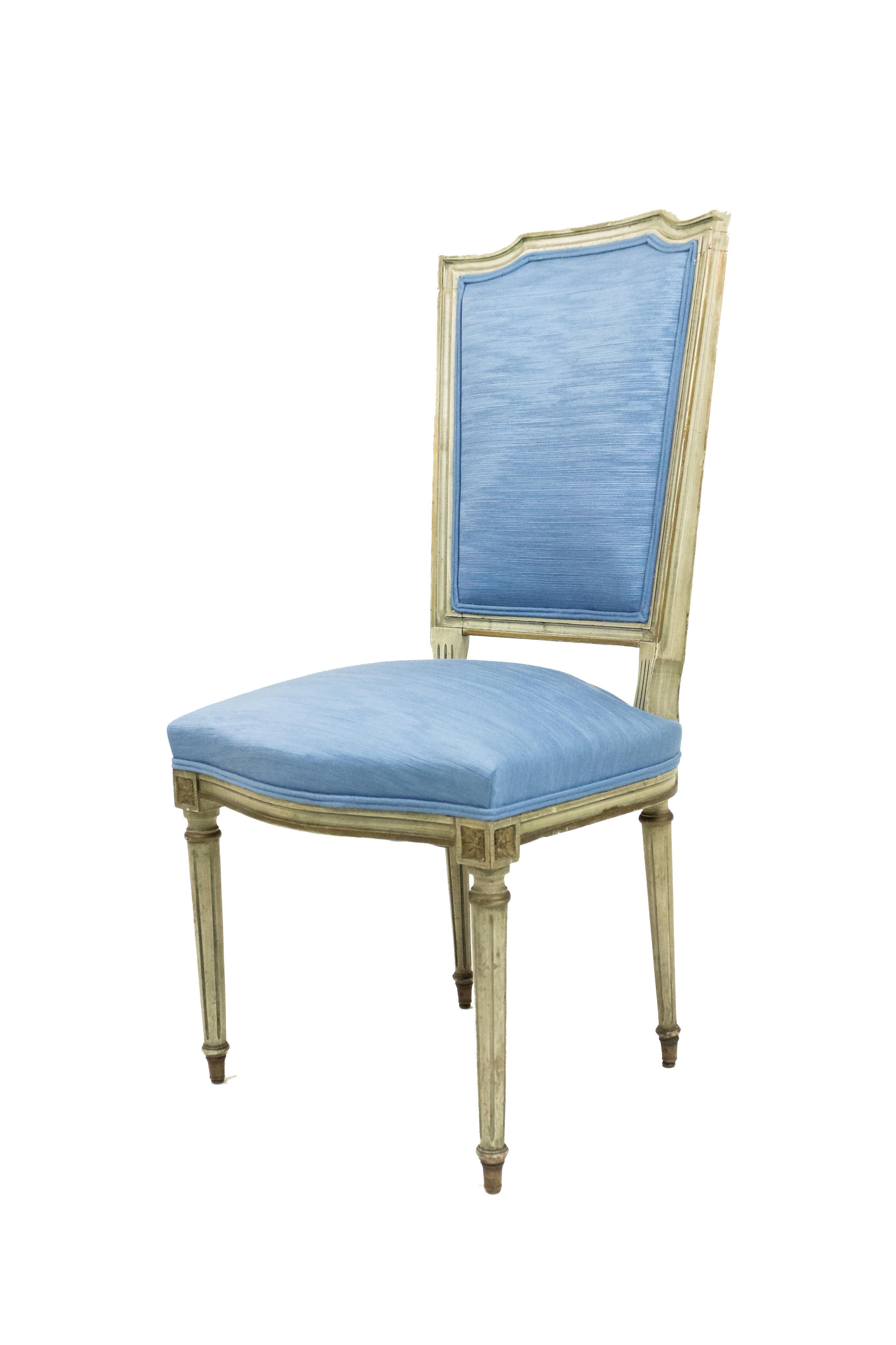 Set of 6 of French Louis XVI style (20th Cent) light green painted side chairs with light blue upholstered seat and back.
