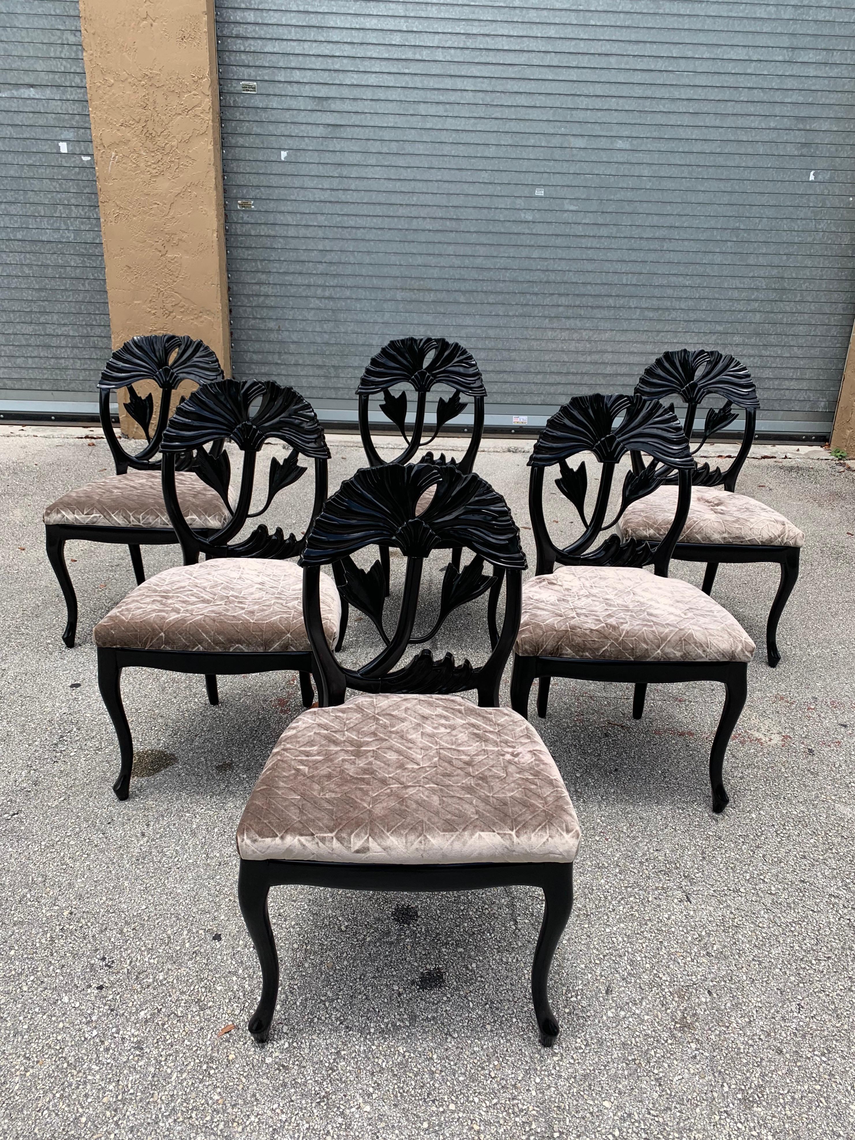 Set of 6 French Mid-Century Modern dining chairs circa 1960s, made of mahogany, the mahogany wood has been ebonized and finished with a French polished high luster, the seats of 6 dining chairs have been newly upholstered in beautiful champagne