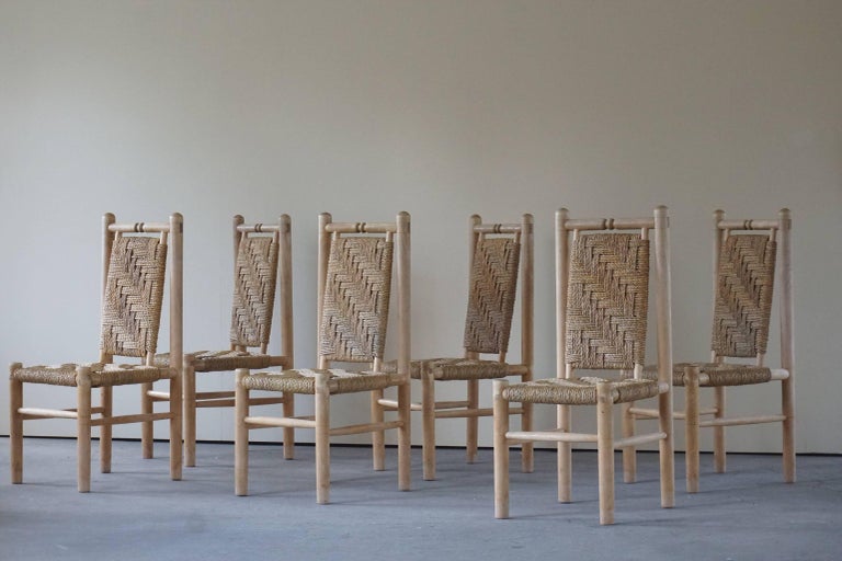 Set of 6 stunning French mid century naturalist woven highback chairs in solid elm, 1960s.
Would fit well in a Brutalist decor as in a more Bohemian one.