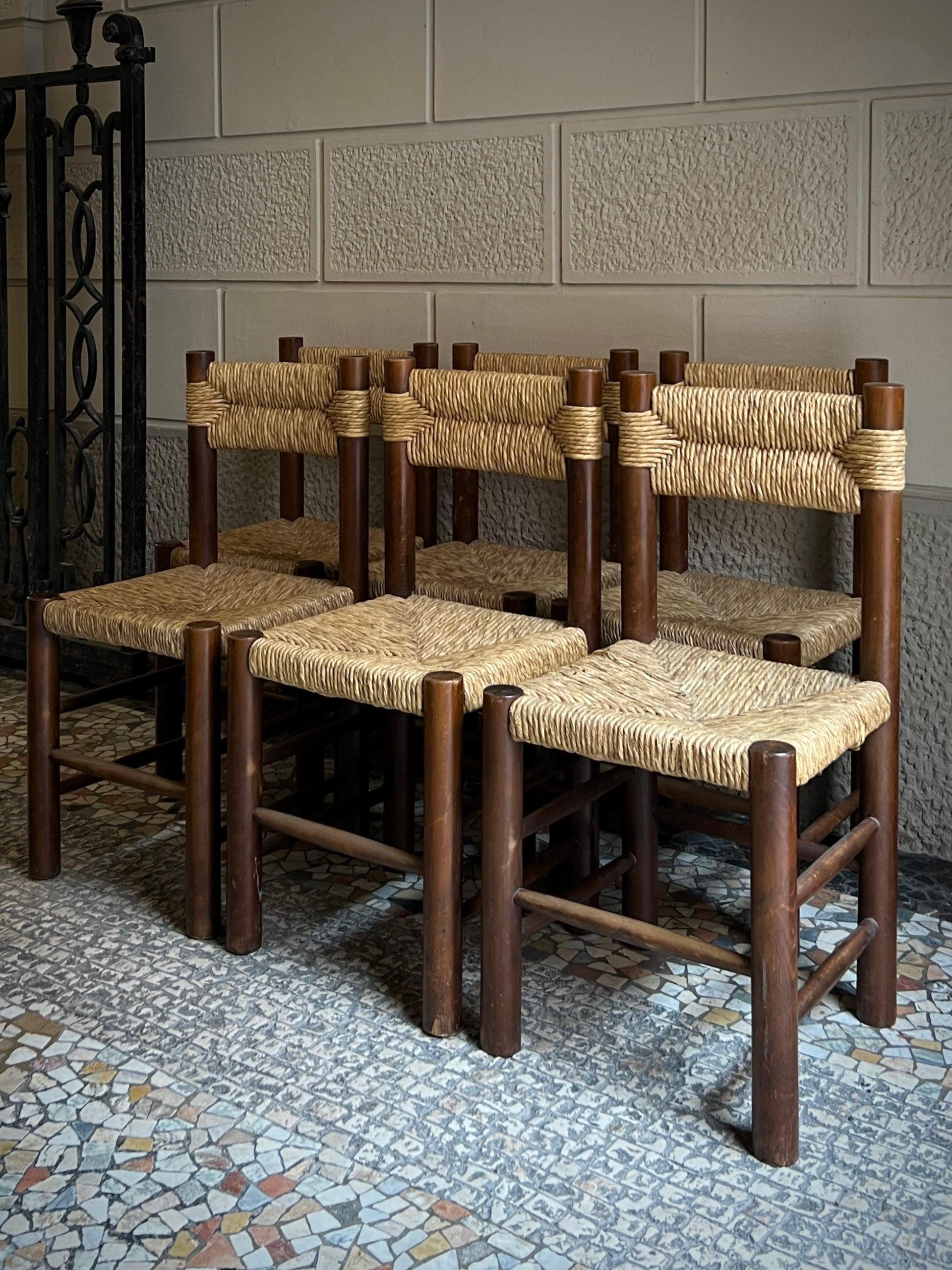 A unique variation of Charlotte Perriand’s “Dordogne” chairs, these are inspired by traditional Japanese folk craft furniture. 

4 chairs are in perfect vintage condition – 2 chairs have very minor breaks to the rush seating – please refer to