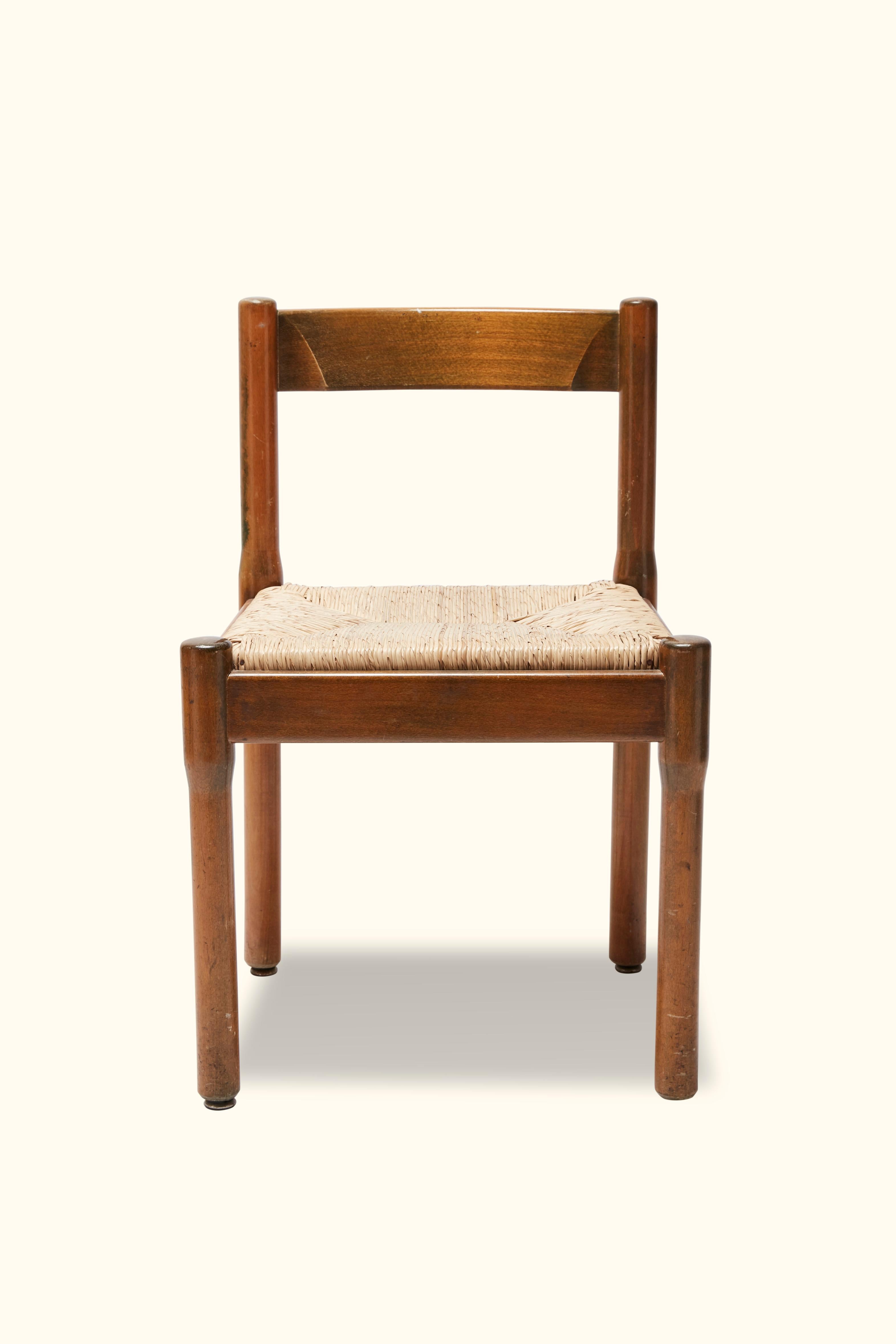 Set of 6 fruitwood dining chairs by Vico Magistretti.