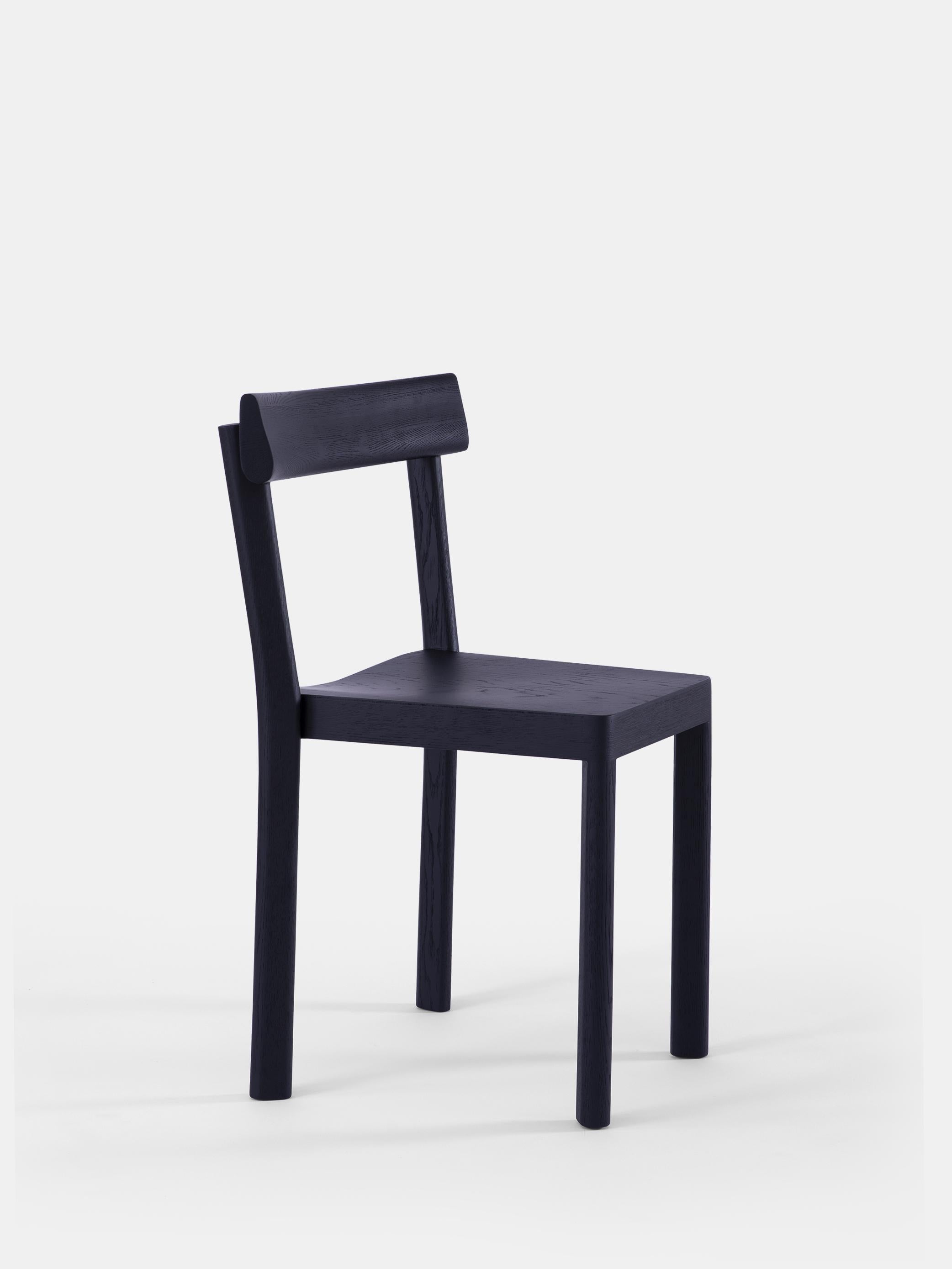 Set of 6 Galta Black Oak Chairs by Kann Design
Dimensions: D 43 x W 51 x H 80 cm.
Materials: Black lacquered oak.
Available in other finishes.

With the Galta, SCMP Design Office rethinks the classic bistro chair. The result is the epitome of