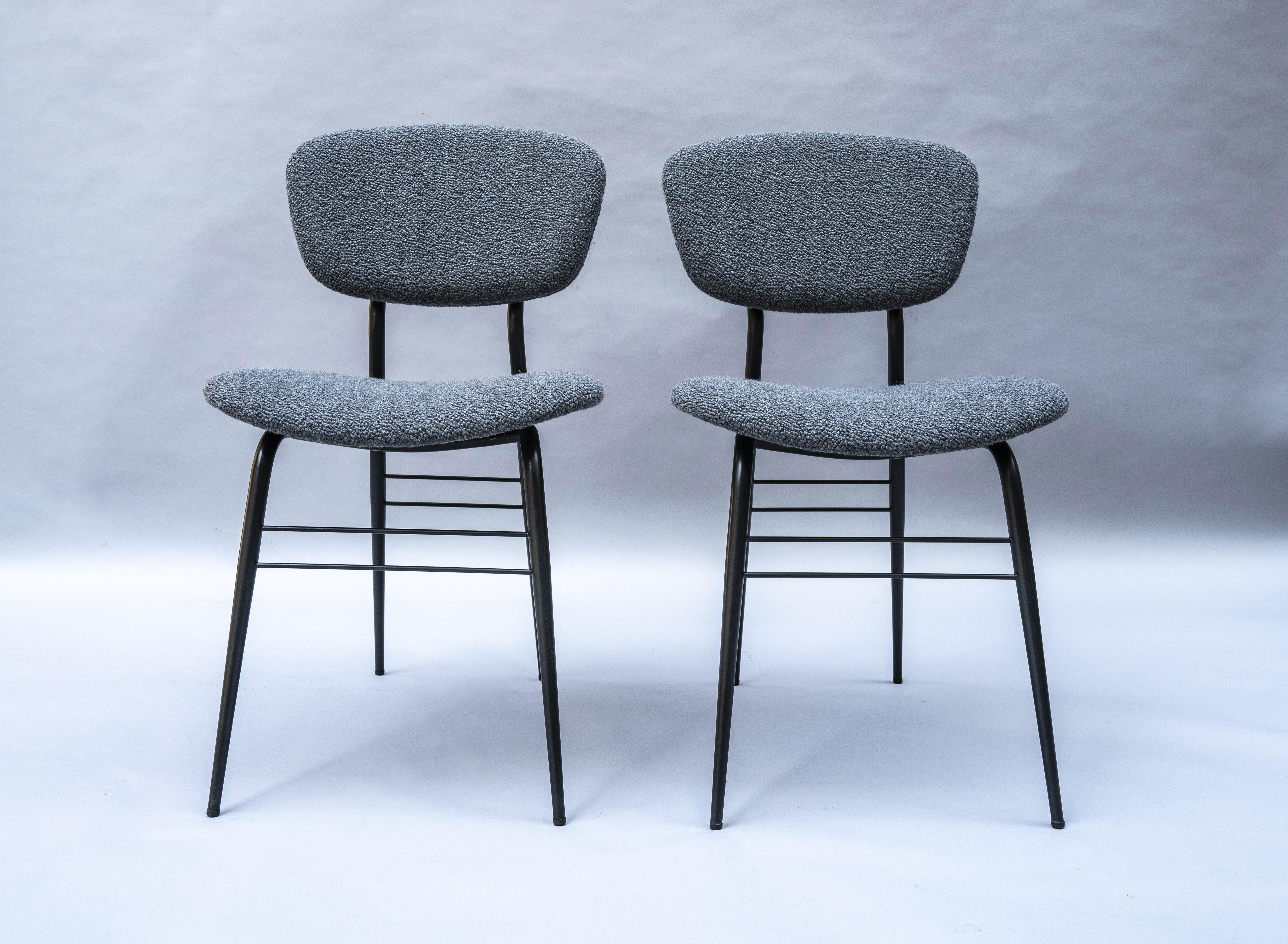 Set of six dining chairs by Gastone Rinaldi, Italy 1950s, completely restored, black painted steel structure, brass details, newly reupholstered
in grey boucle' by Larsen.