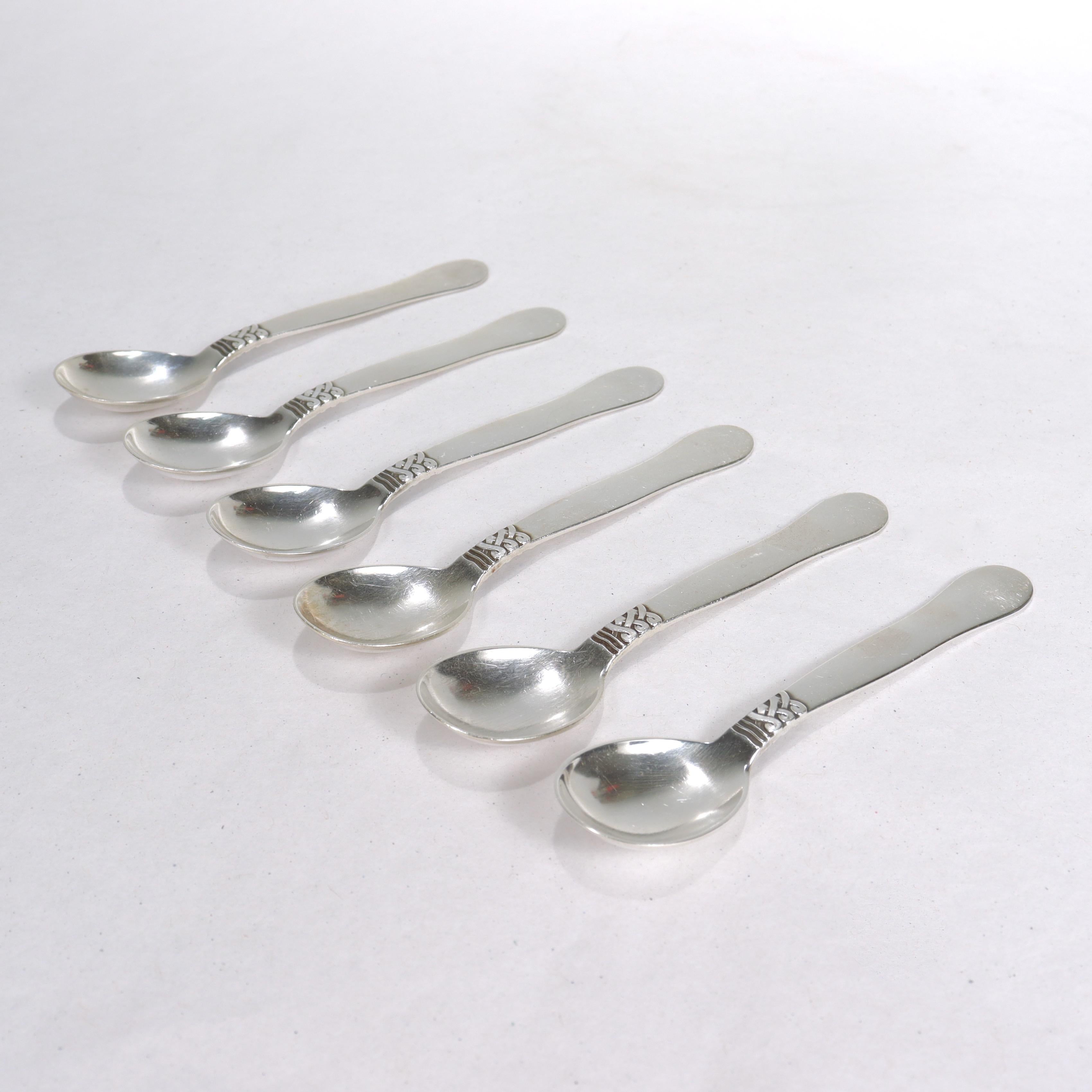 A fine set of 6 sterling silver demitasse or coffee spoons.

By Georg Jensen.

Designed by Oscar Gundlach-Pedersen in 1937.

These spoons have a post-1945 factory mark.

Simply a wonderful set of Georg Jensen spoons!

Date:
20th Century

Overall