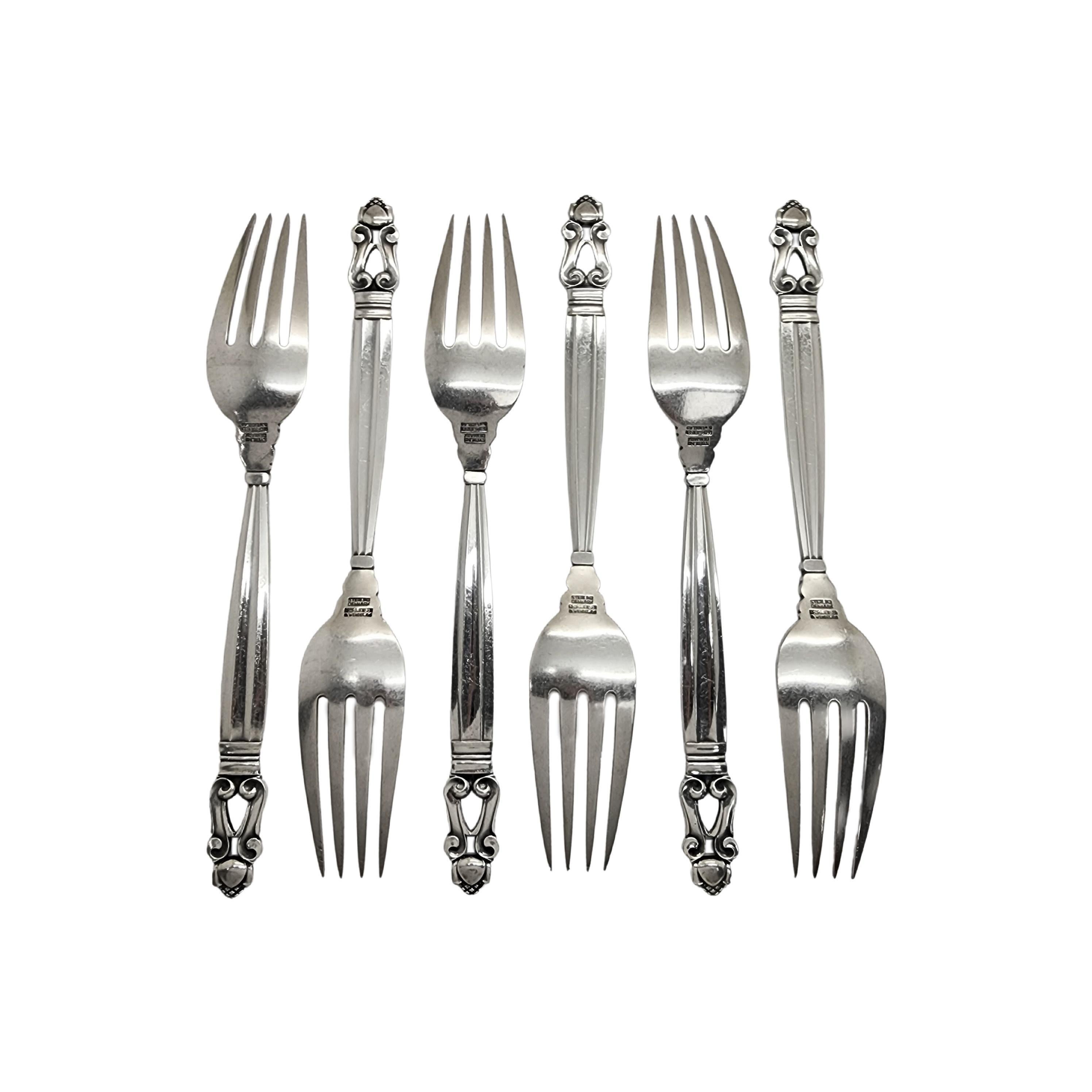 Set of 6 sterling silver dinner forks in the Acorn pattern by Georg Jensen.

The Acorn pattern was introduced in 1915 as a collaboration between Georg Jensen and designer Johan Ronde. The Acorn pattern, which combines Art Nouveau and Art Deco