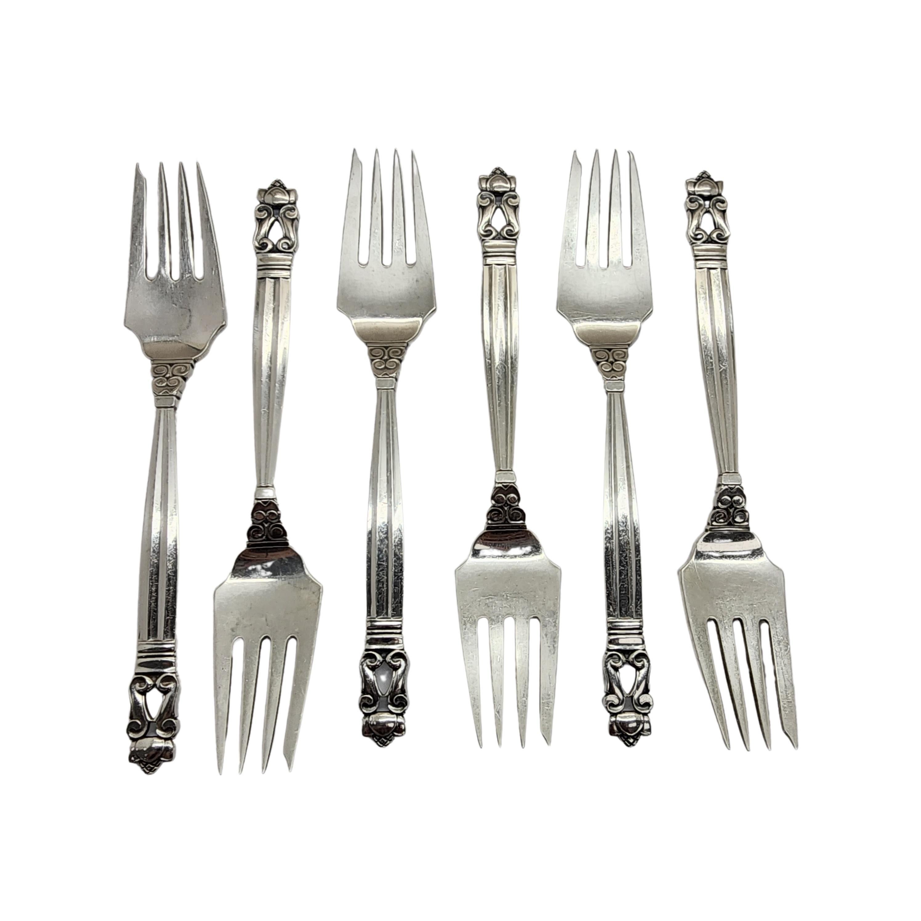 Set of 6 sterling silver salad forks in the Acorn pattern by Georg Jensen.

The Acorn pattern was introduced in 1915 as a collaboration between Georg Jensen and designer Johan Ronde. The Acorn pattern, which combines Art Nouveau and Art Deco styles,