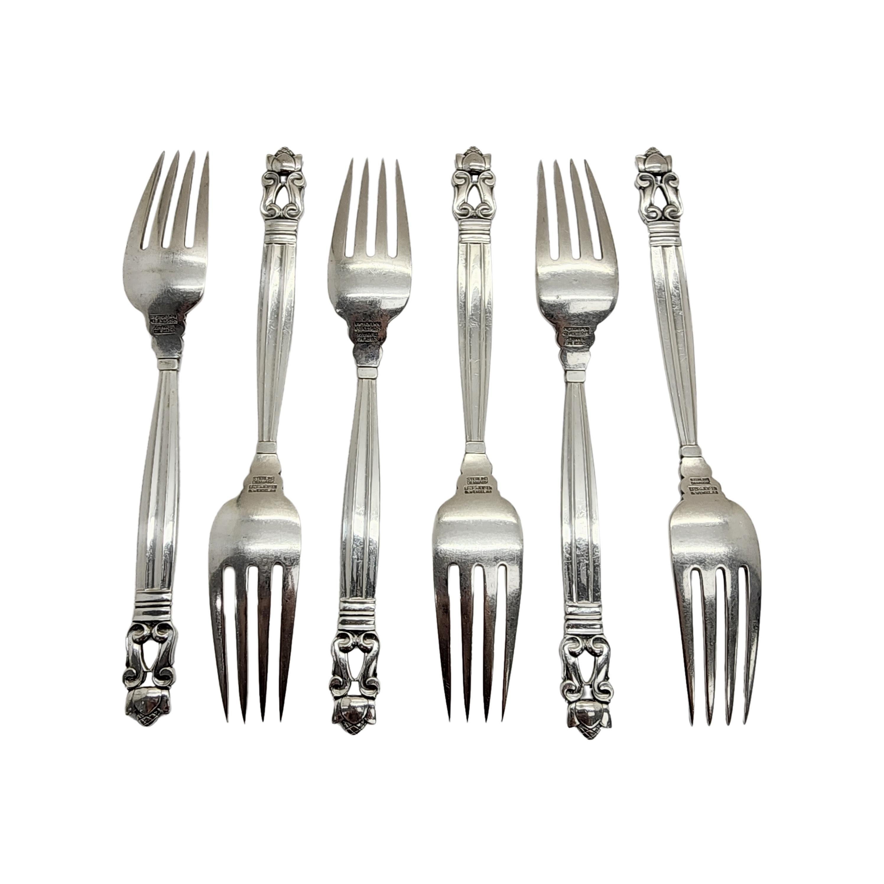 Set of 6 sterling silver forks in the Acorn pattern by Georg Jensen.

The Acorn pattern was introduced in 1915 as a collaboration between Georg Jensen and designer Johan Ronde. The Acorn pattern, which combines Art Nouveau and Art Deco styles, has