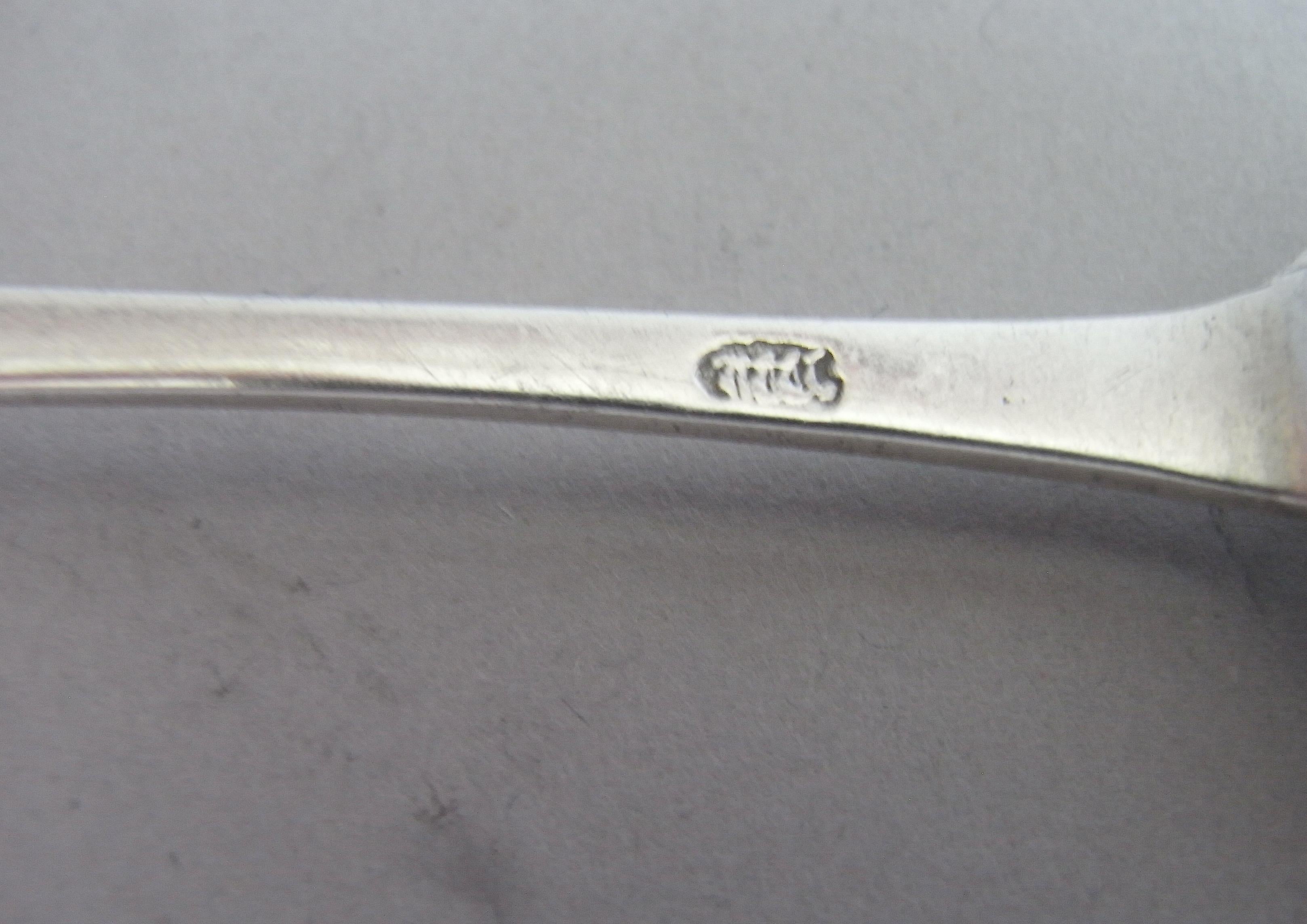 An Extremely Rare Set of Six George II Scots Fiddle Pattern Teaspoons Made in Edinburgh circa 1745 by John Welsh.

The Teaspoons are modelled in the very rare Scots Fiddle Pattern, a design peculiar to Scotland.  Each has a drop on the back of the