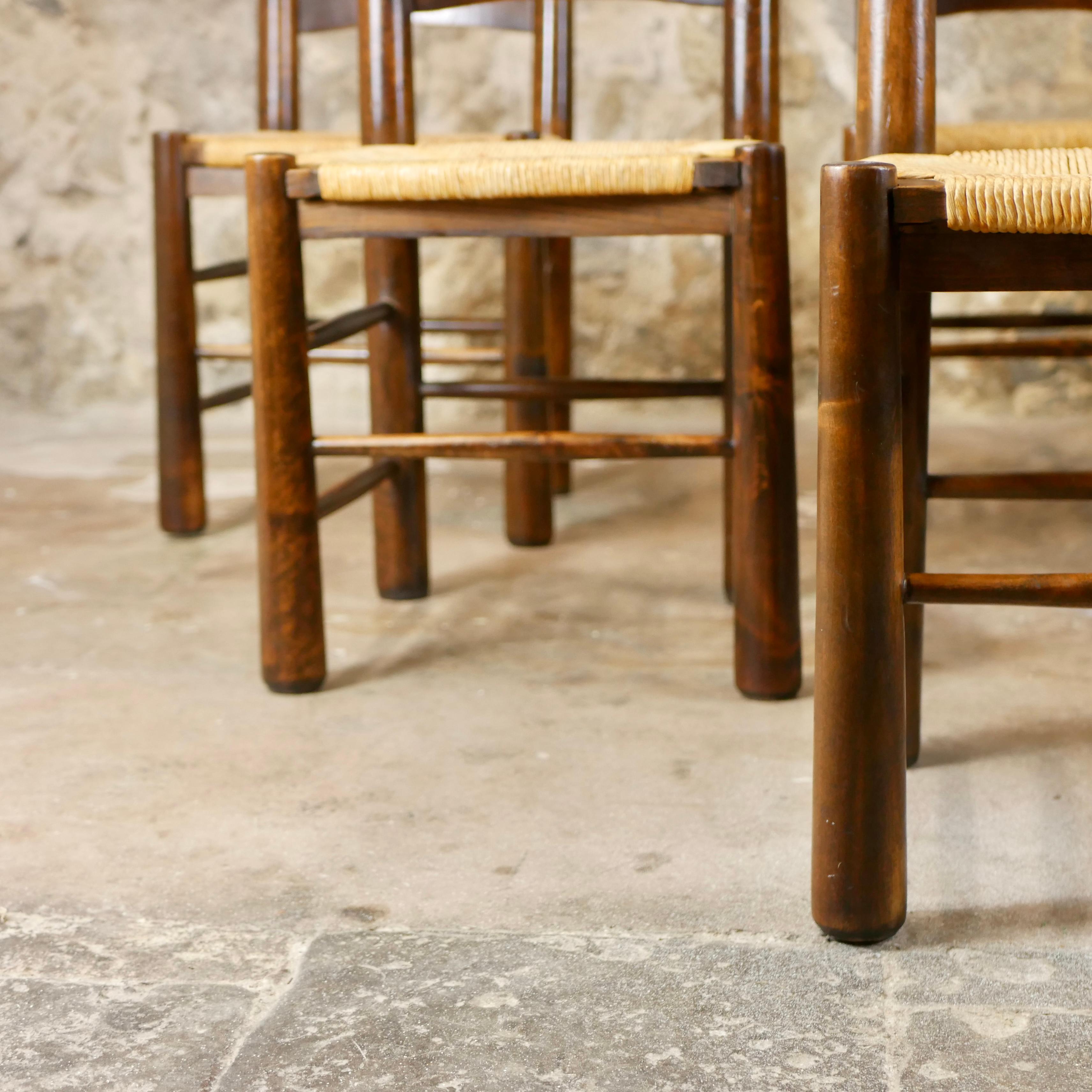 Mid-20th Century Set of 6 Georges Robert wood and straw chairs, made in France, 1950s For Sale