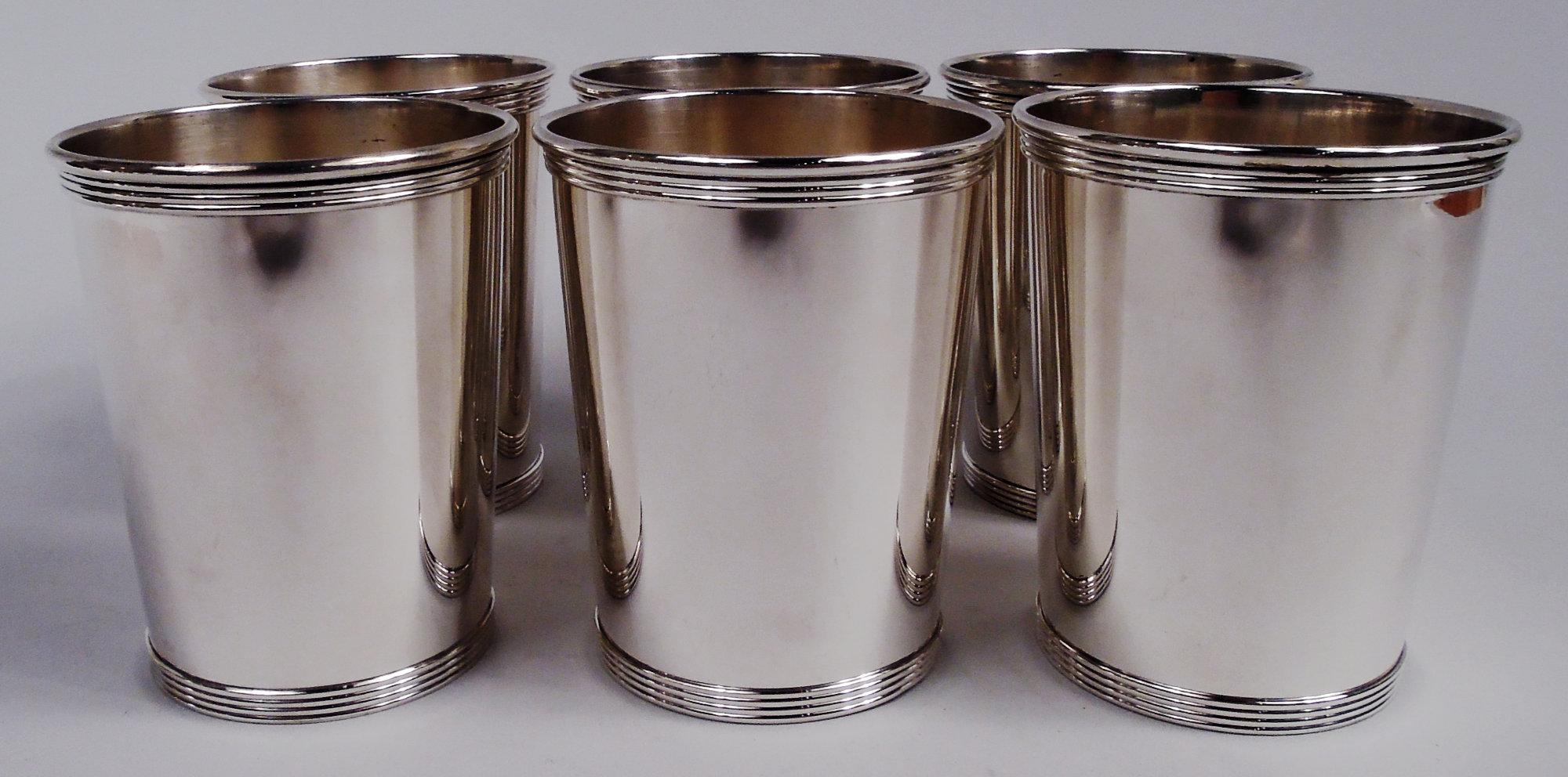 Set of 6 sterling silver mint julep cups. Made by Gorham in Providence. Each: Straight and tapering sides, reeded rim and foot. Marked “Newport / Sterling 1673”. Newport was a Gorham brand. Total weight: 22 troy ounces.  