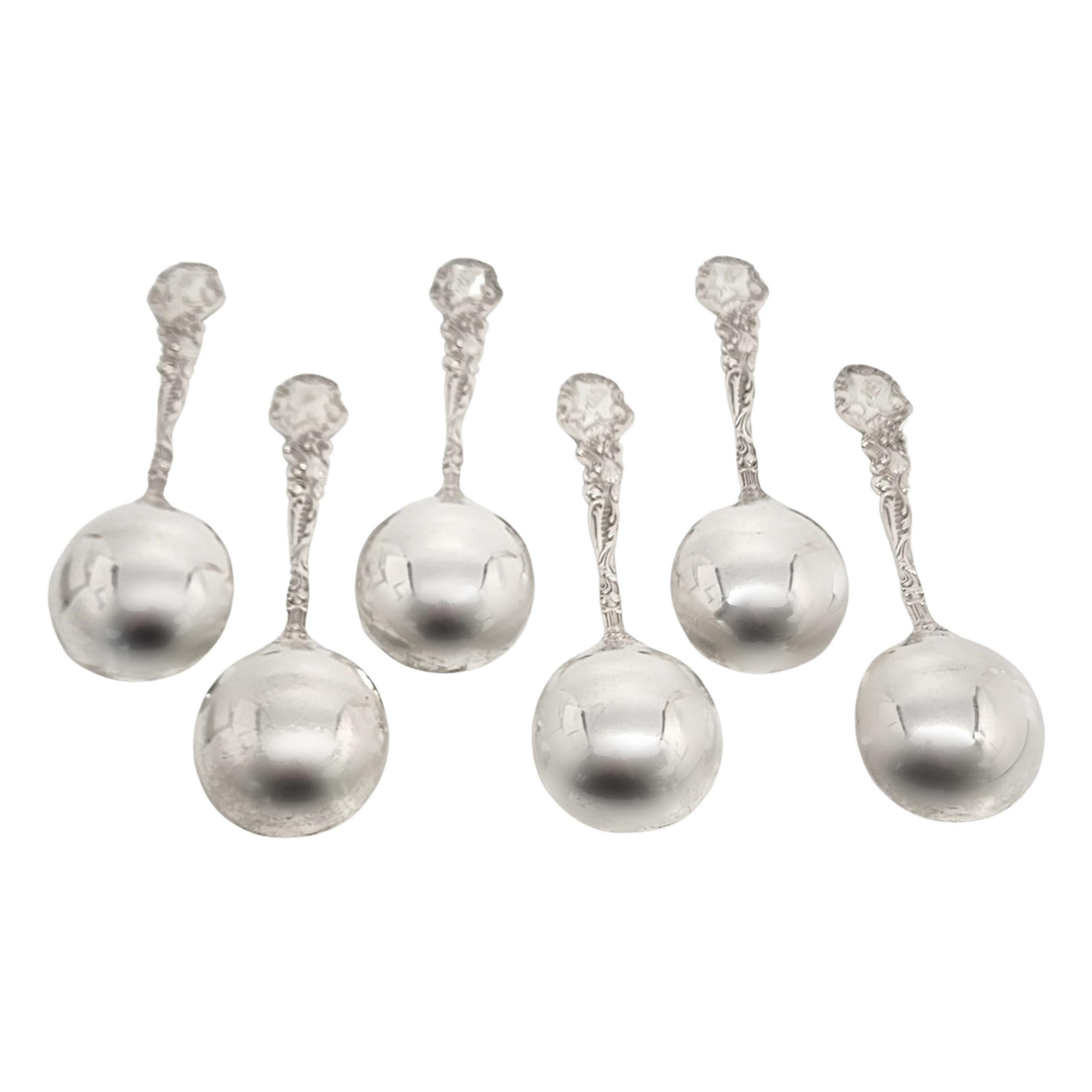 Set of 6 sterling silver round bowl soup bouillon spoons by Gorham in the Versailles pattern with a monogram.

Monogram appears to be ALB, on the back of the handle.

Gorham's Versailles is a multi motif pattern designed by Antoine Heller in 1885.